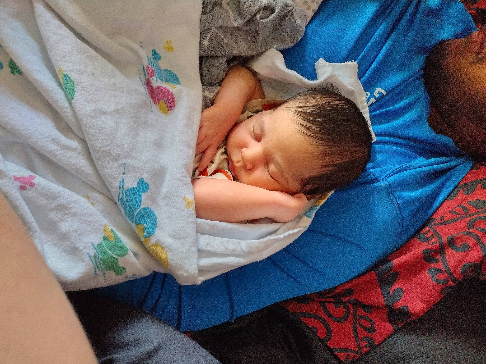 Maxwell is registered to the contest to win money with this photo: baby, baby_products, baby_toddler_clothing, bedtime, child, comfort, elbow, event, fun, grass, happy, hat, leisure, linens, nap, pattern, person, room, sitting, skin