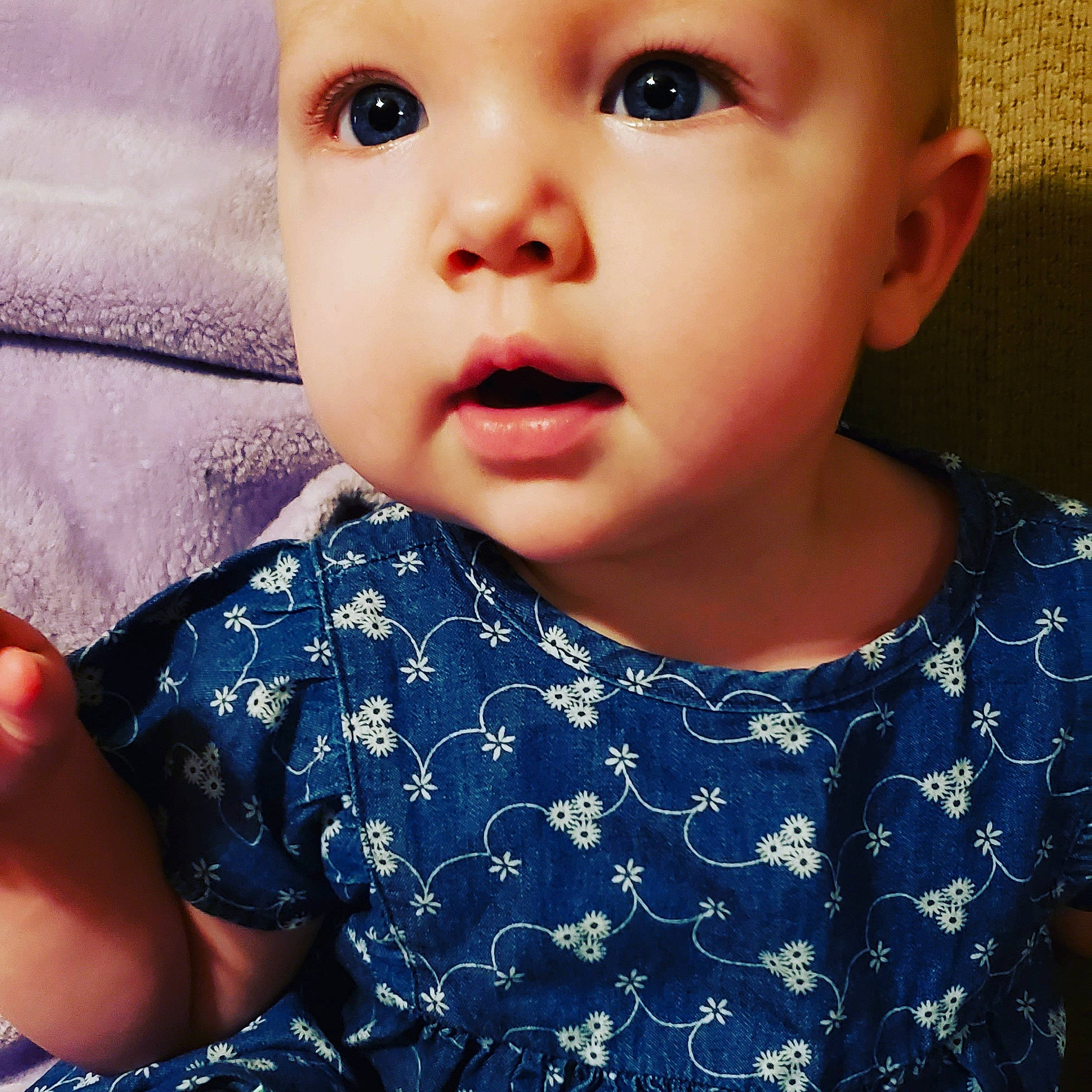 Amanda is registered to the contest to win money with this photo: baby, baby_toddler_clothing, blue, cheek, chin, cool, eyebrow, eyelash, face, facial_expression, gesture, hairstyle, happy, iris, lip, neck, nose, person, skin, sleeve