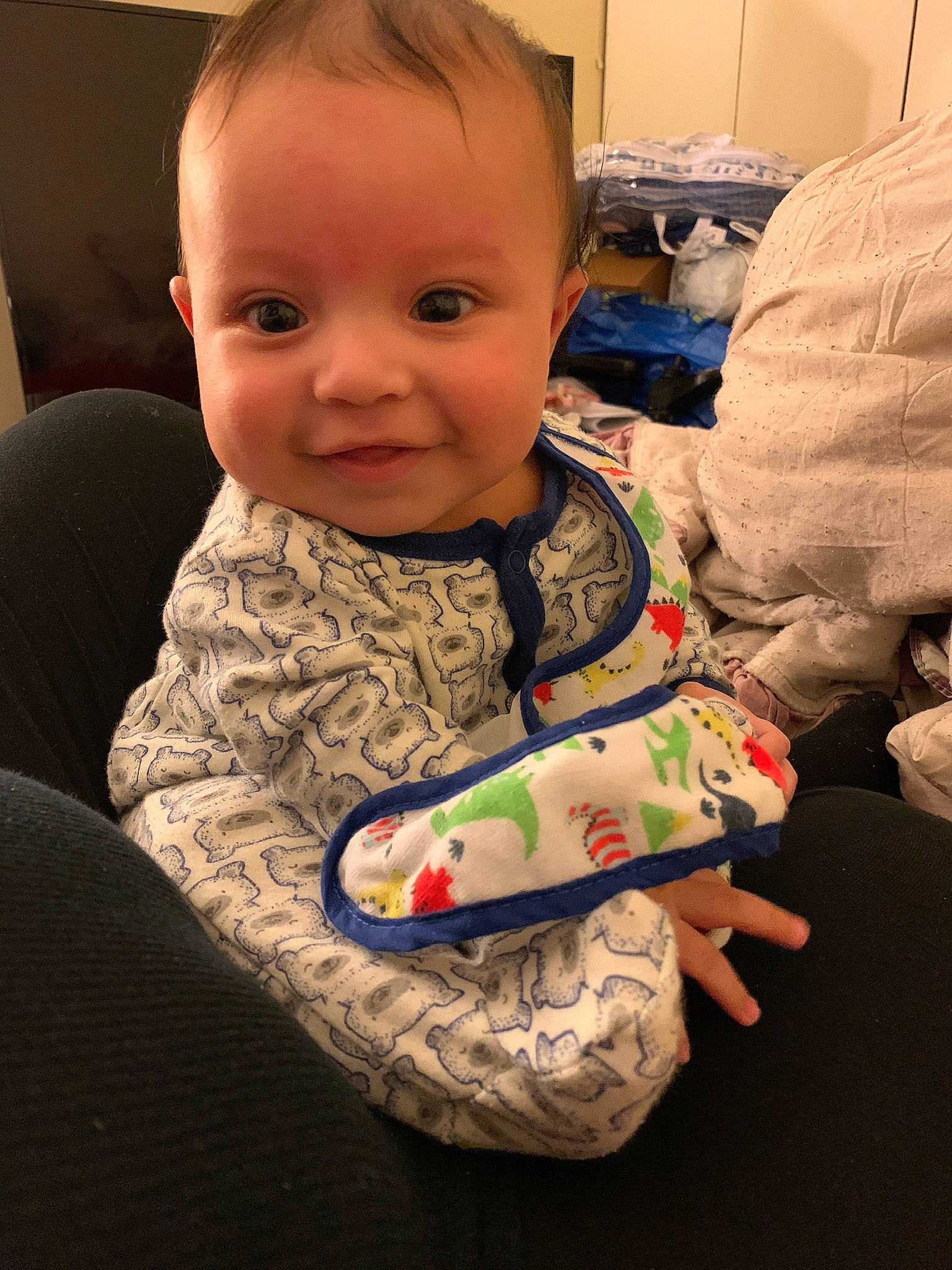 Evan is registered to the contest to win money with this photo: arm, baby, cheek, child, ear, head, person, play, sitting, skin, toddler