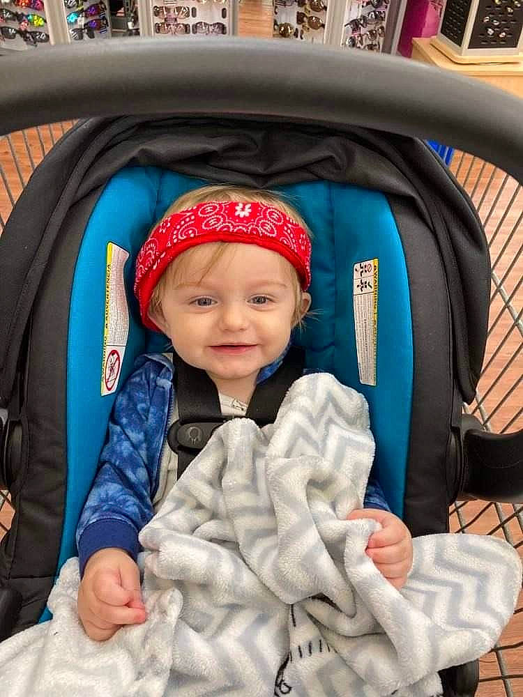 Colsen is registered to the contest to win money with this photo: baby, baby_carriage, baby_safety, baby_toddler_clothing, blue, car_seat, cheek, comfort, eye, face, happy, head, headwear, jacket, joy, person, photograph, product, skin, sleeve