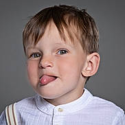 Greyson joined the competition — help win amazing prizes! child, boy, tongue_out, white_shirt, suspenders, portrait, playful, light_brown_hair, gray_background, cute, face, head, smiling, studio, expression, casual, young, innocent, funny, closeup