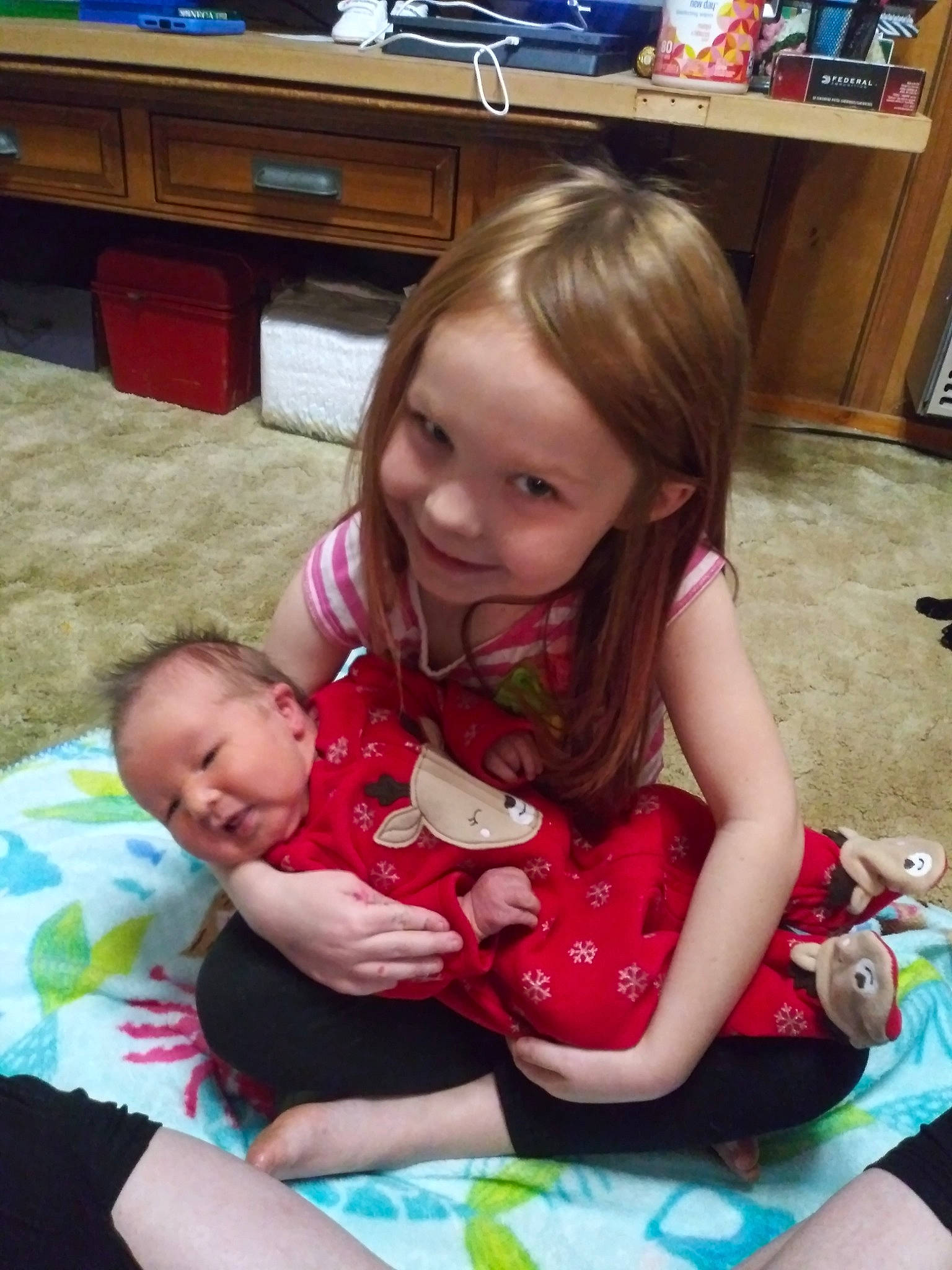 Harmonie joined the competition — help win amazing prizes! baby, child, daughter, fun, lap, mother, person, play, sibling, sitting, toddler