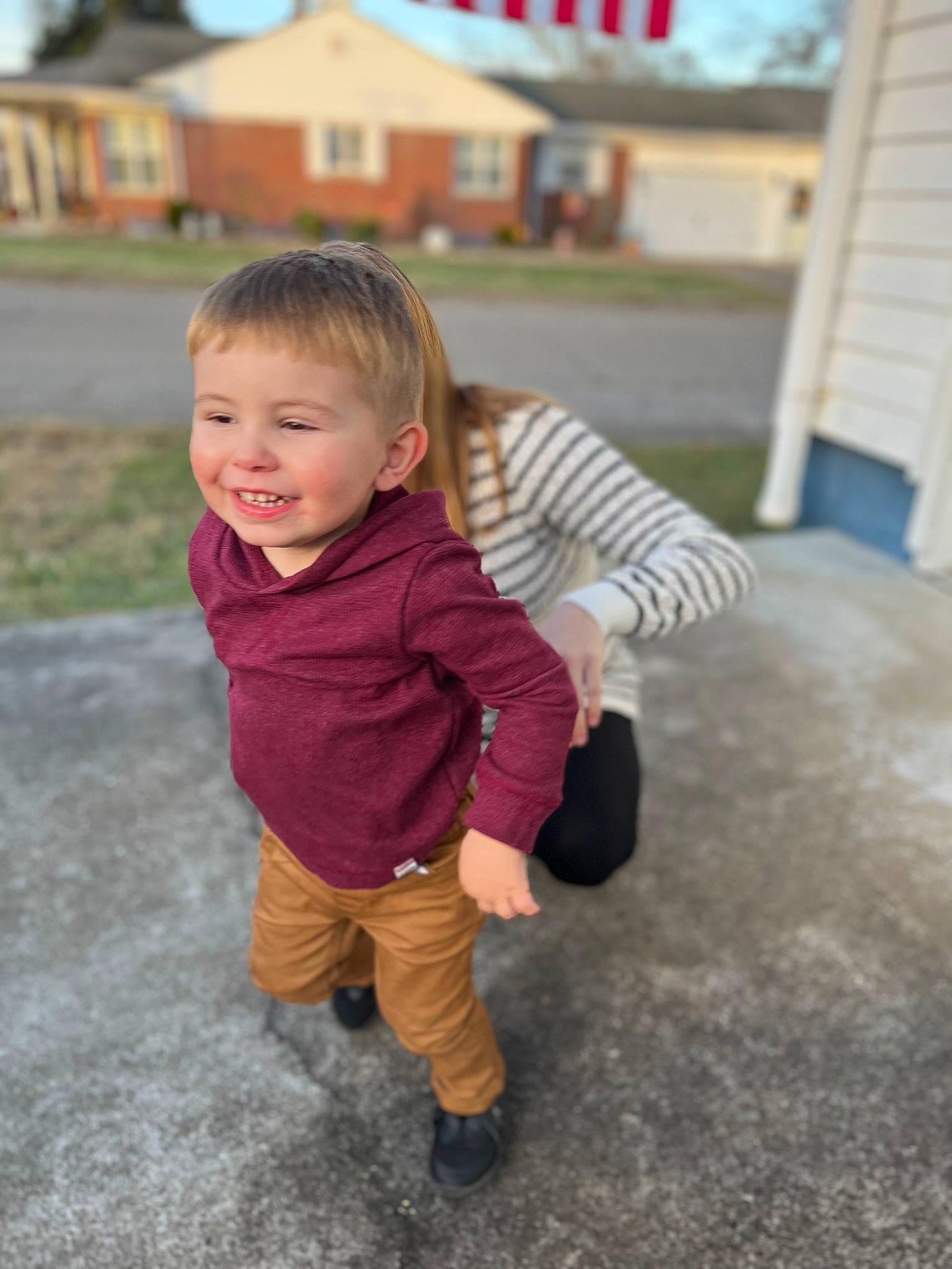 Kato joined the competition — help win amazing prizes! asphalt, baby, baby_toddler_clothing, boot, child, face, facial_expression, flooring, fun, grass, happy, joy, leisure, person, plant, play, recreation, skin, sleeve, smile