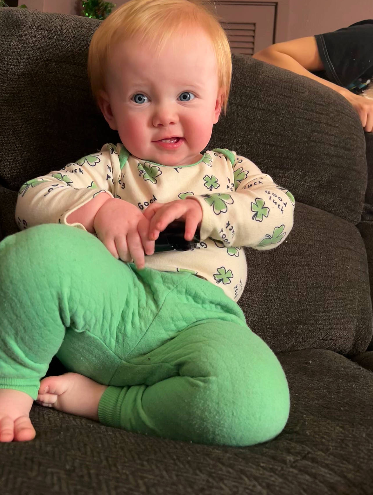Brieley joined the competition — help win amazing prizes! baby, baby_toddler_clothing, cheek, chin, comfort, couch, eye, face, finger, happy, head, human_body, iris, lap, leg, person, skin, sleeve, smile, thigh