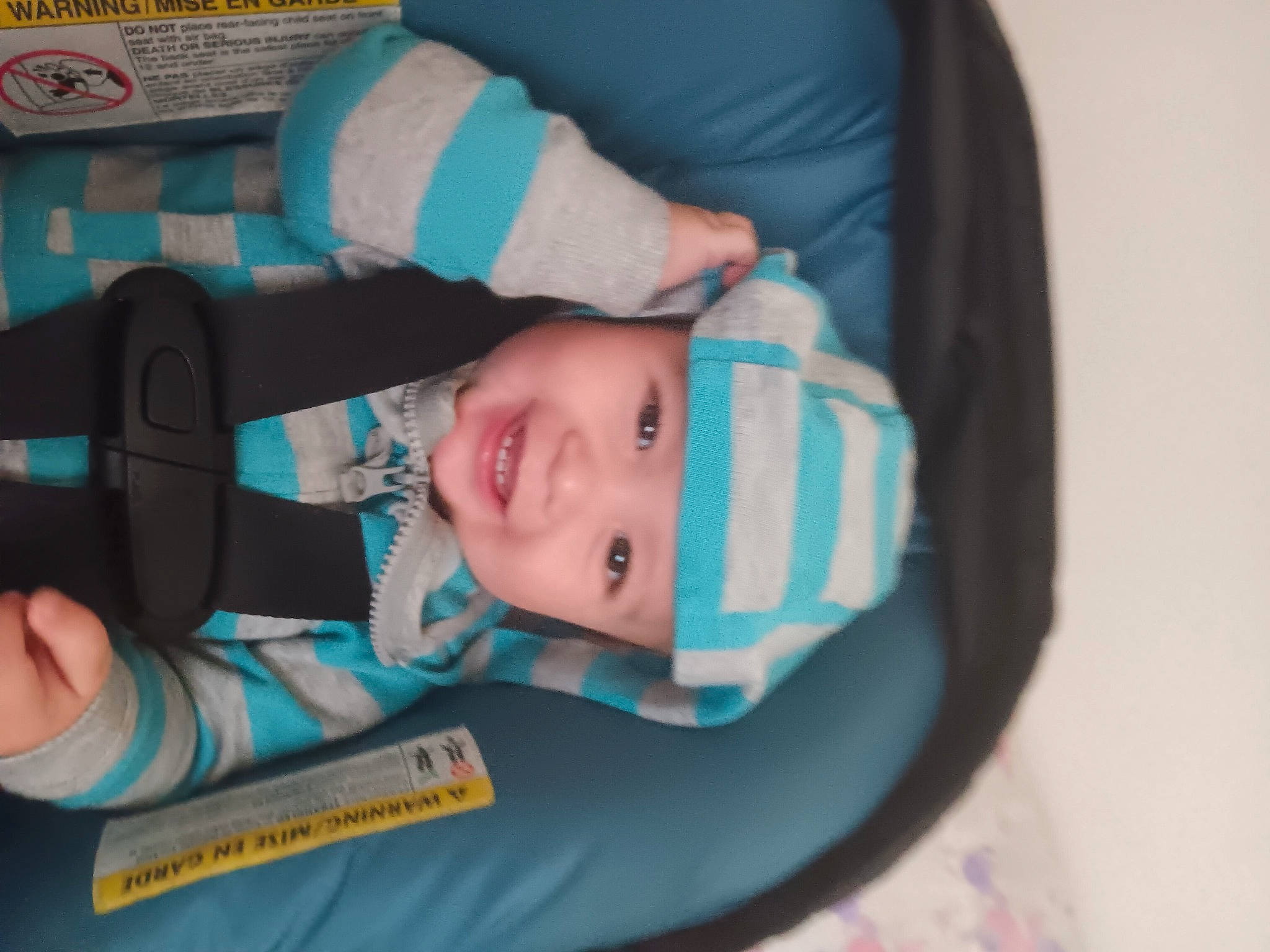 Zaiden joined the competition — help win amazing prizes! baby, baby_carriage, baby_products, baby_safety, baby_toddler_clothing, cheek, child, comfort, electric_blue, hat, headwear, joy, person, skin, sleeve, toddler