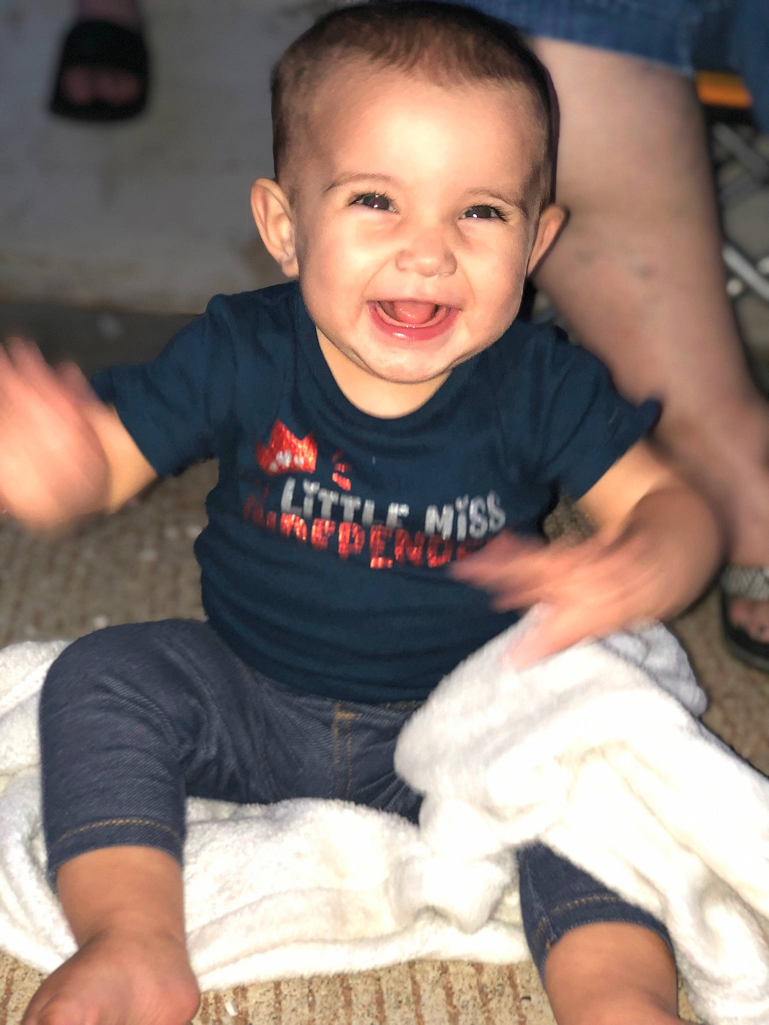 Melani is registered to the contest to win money with this photo: arm, baby_toddler_clothing, cheek, chin, comfort, eye, face, facial_expression, finger, flash_photography, hairstyle, hand, happy, head, joy, mammal, muscle, person, skin, sleeve