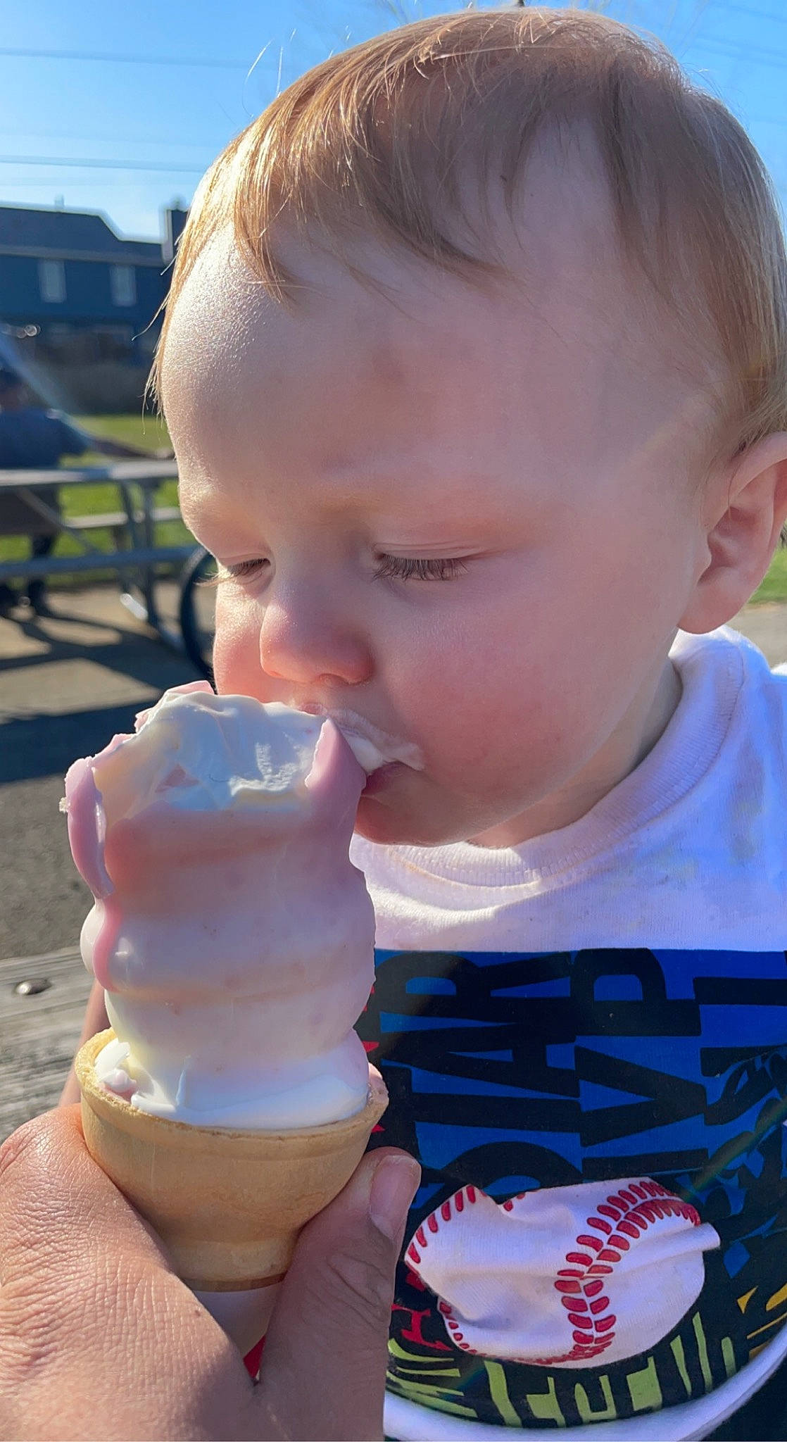 Axel is registered to the contest to win money with this photo: baby, baby_toddler_clothing, beauty, cheek, child, drinkware, eyelash, finger, food, fun, gelato, grass, happy, ice_cream, neck, nose, person, skin, smile, summer