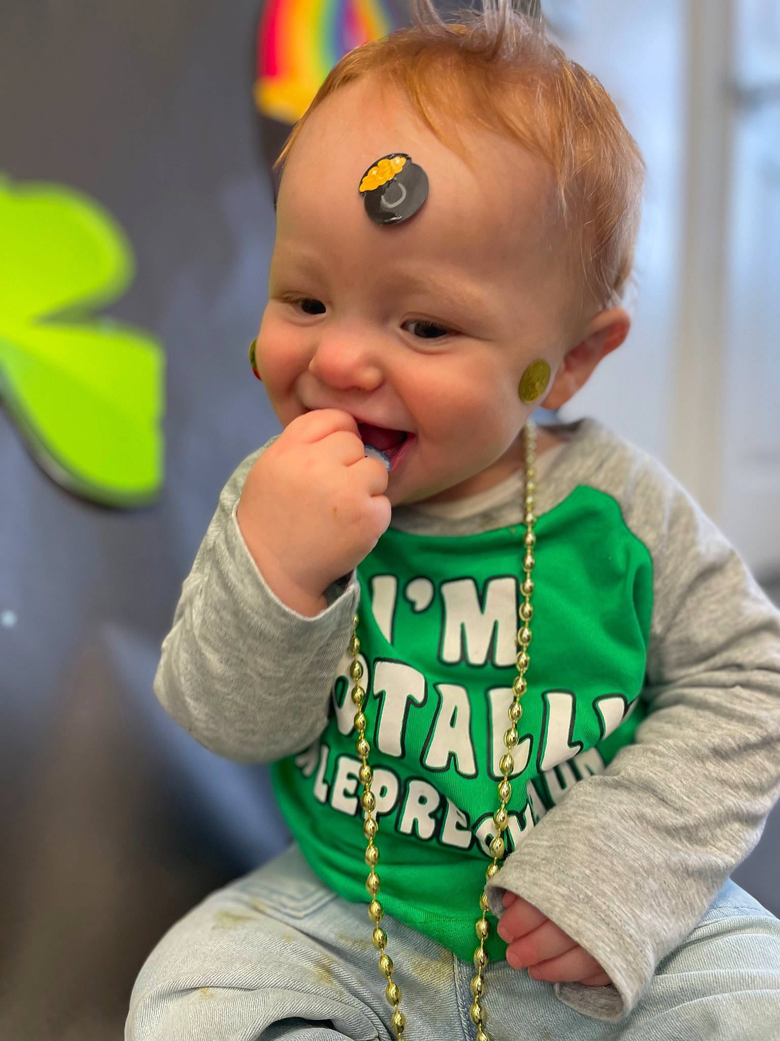 Axel is registered to the contest to win money with this photo: baby, baby_toddler_clothing, cheek, eye, face, gesture, grass, green, hair, happy, head, nose, person, photograph, skin, sleeve, smile, snapshot, t_shirt, toddler
