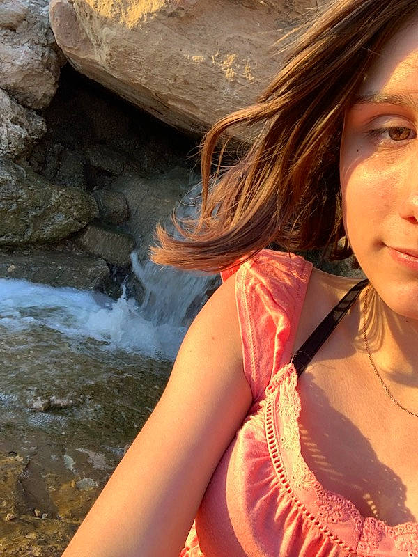 Madisyn is registered to the contest to win money with this photo: black_hair, brown_hair, cool, flash_photography, hair, happy, jewellery, landscape, layered_hair, leisure, lip, long_hair, peach, people_in_nature, person, skin, spring, stream, summer, sunlight