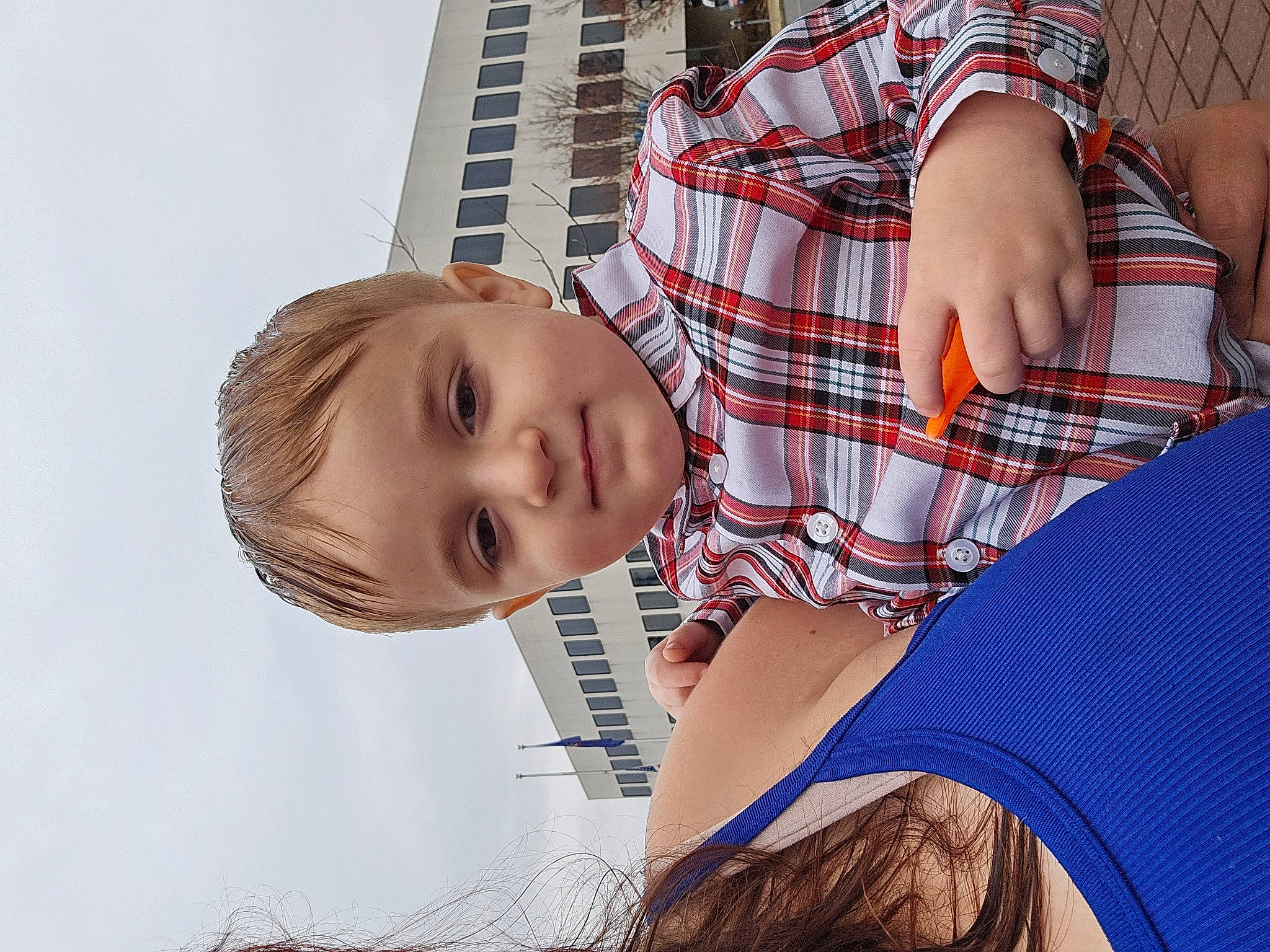 Bentley joined the competition — help win amazing prizes! child, elbow, electric_blue, eyewear, fun, grass, happy, human_leg, leisure, pattern, person, plaid, sitting, sky, smile, tartan, thigh, toddler, tree, waist