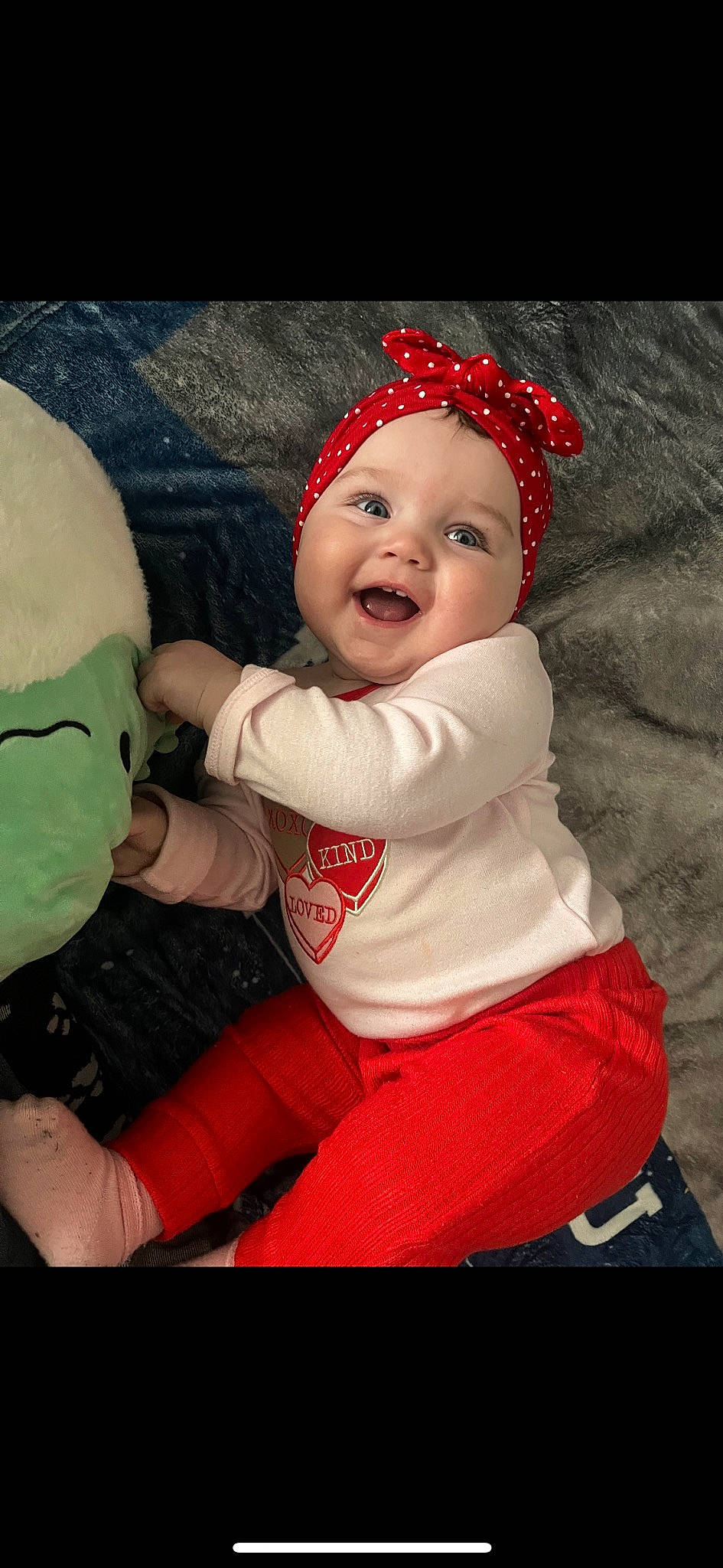 Ayla is registered to the contest to win money with this photo: baby, baby_toddler_clothing, beauty, cap, child, christmas, clothing, costume_hat, fictional_character, grass, happy, headgear, headwear, holiday, lap, person, pink, plant, sleeve, smile