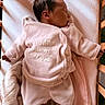 Lou participe au concours pour gagner de l'argent avec cette photo : arm, baby, bassinet, bedding, blanket, closeup, crib, face_profile, finger, hair, infant, newborn, onesie, pacifier, peaceful, pink_clothing, portrait, sleeping, soft_texture, wooden_frame