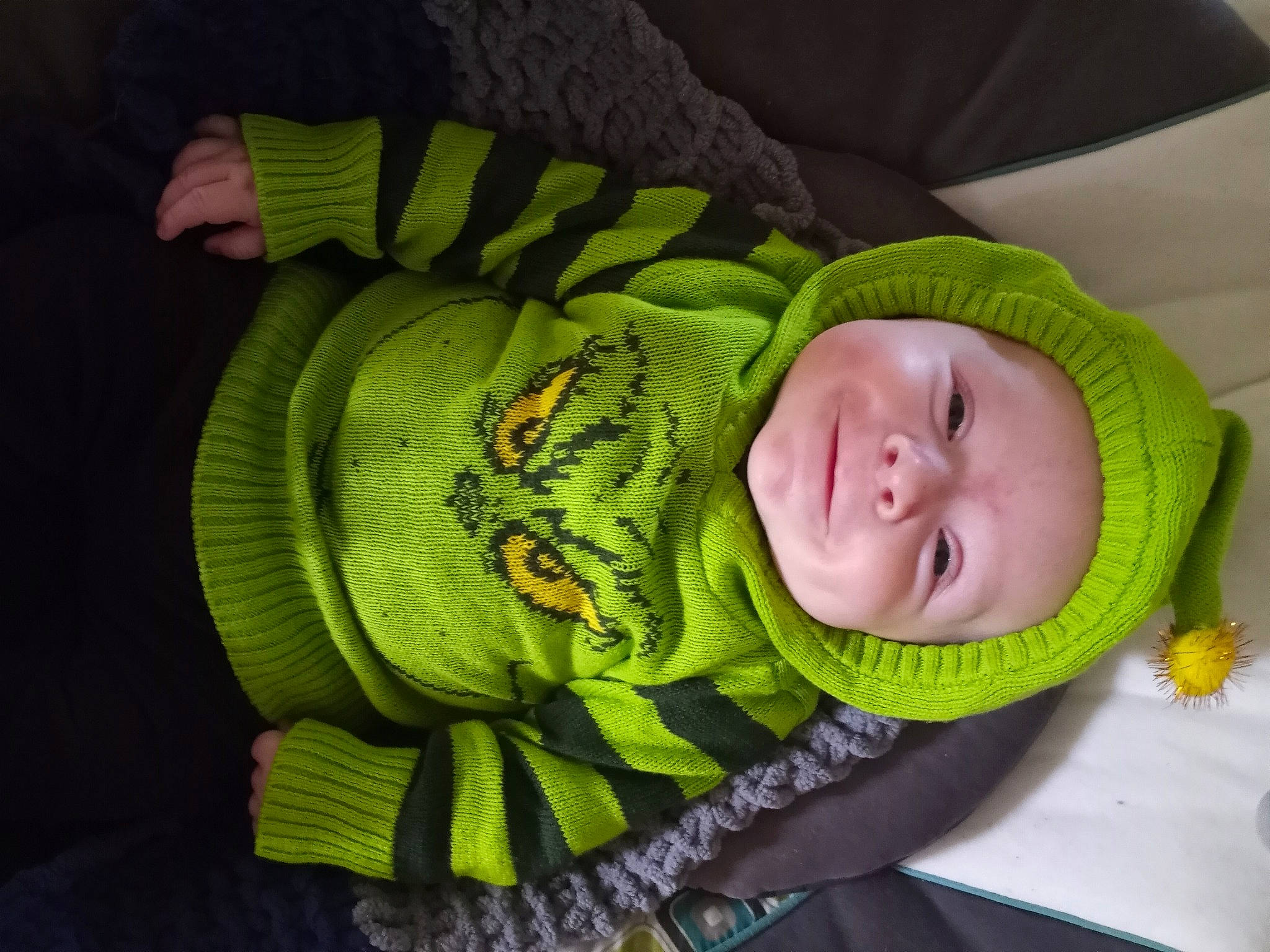 Wyatt is registered to the contest to win money with this photo: baby, baby_products, baby_safety, baby_sleeping, baby_toddler_clothing, beanie, bedtime, cheek, comfort, eye, headgear, headwear, knit_cap, linens, nap, person, room, sleeve, smile, toddler