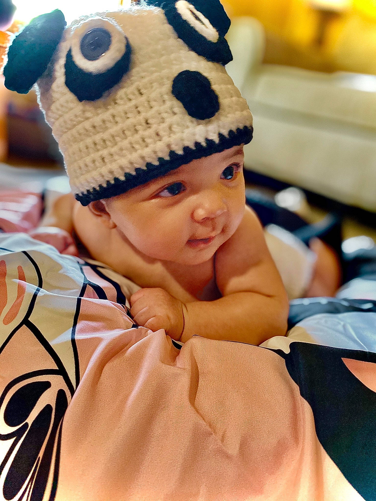Zariah is registered to the contest to win money with this photo: baby, baby_sleeping, baby_toddler_clothing, beanie, cap, cheek, comfort, fashion_accessory, fun, happy, headgear, headwear, knit_cap, pattern, person, personal_protective_equipment, sleeve, toddler, white, wool