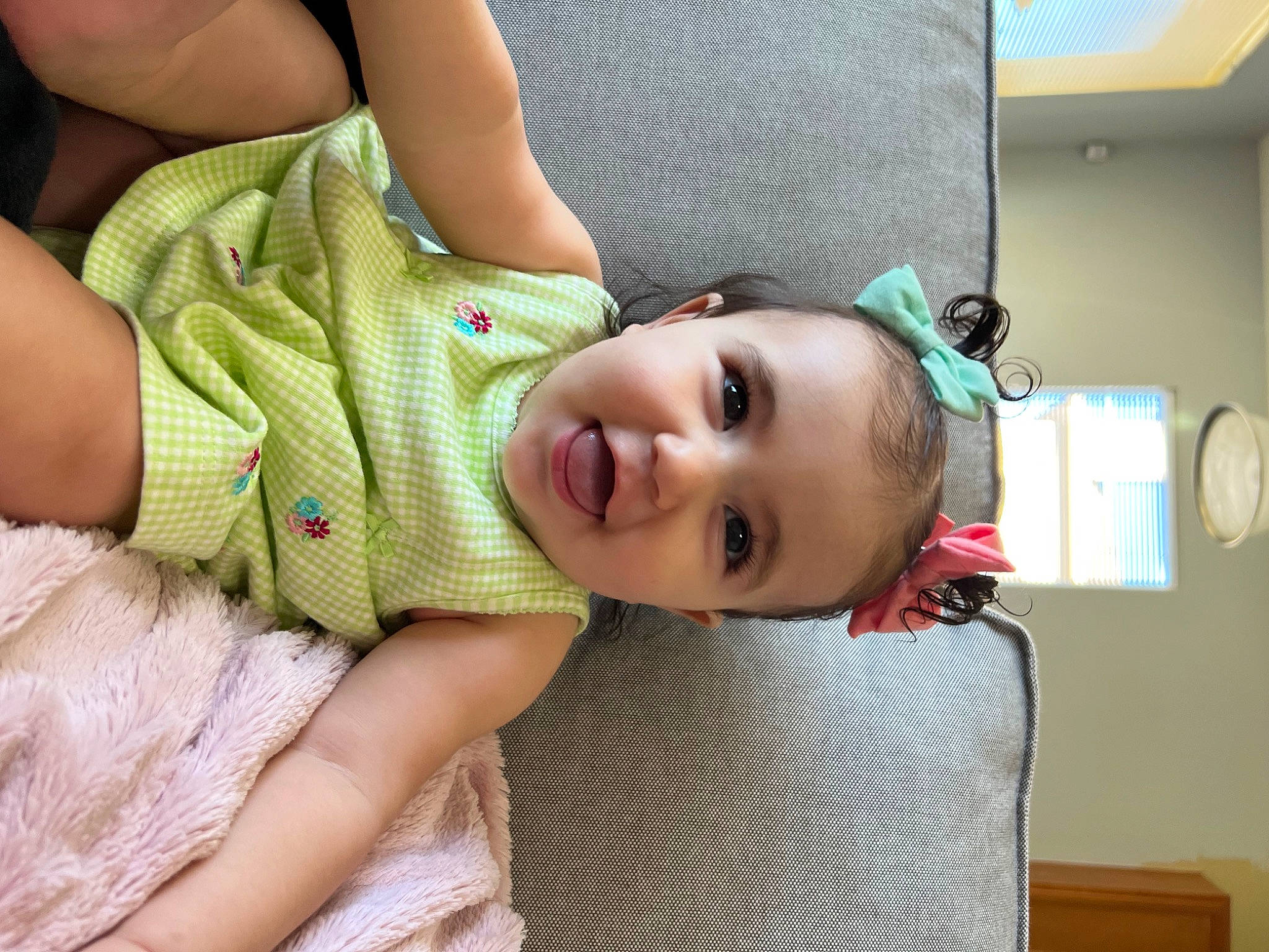 Valentina is registered to the contest to win money with this photo: baby, baby_products, baby_toddler_clothing, cheek, child, comfort, eyelash, facial_expression, fun, gesture, happy, human_body, iris, leg, lip, mouth, nose, person, skin, smile