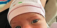 Ourania joined the competition — help win amazing prizes! baby, beanie, beverage, bodypart, bonnet, cap, clothing, coffee, coffeecup, cup, face, finger, hand, hat, head, milk, newborn, person, photography, portrait