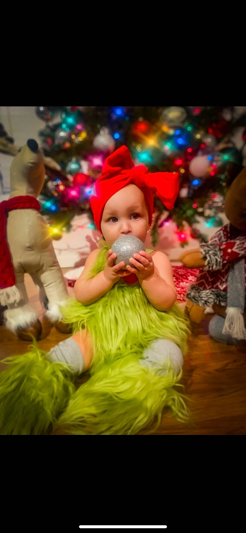 Hayden joined the competition — help win amazing prizes! baby, child, christmas, christmas_decoration, christmas_eve, christmas_ornament, christmas_tree, costume_hat, event, fictional_character, fun, happy, hat, headwear, holiday, human_body, magenta, ornament, person, toddler