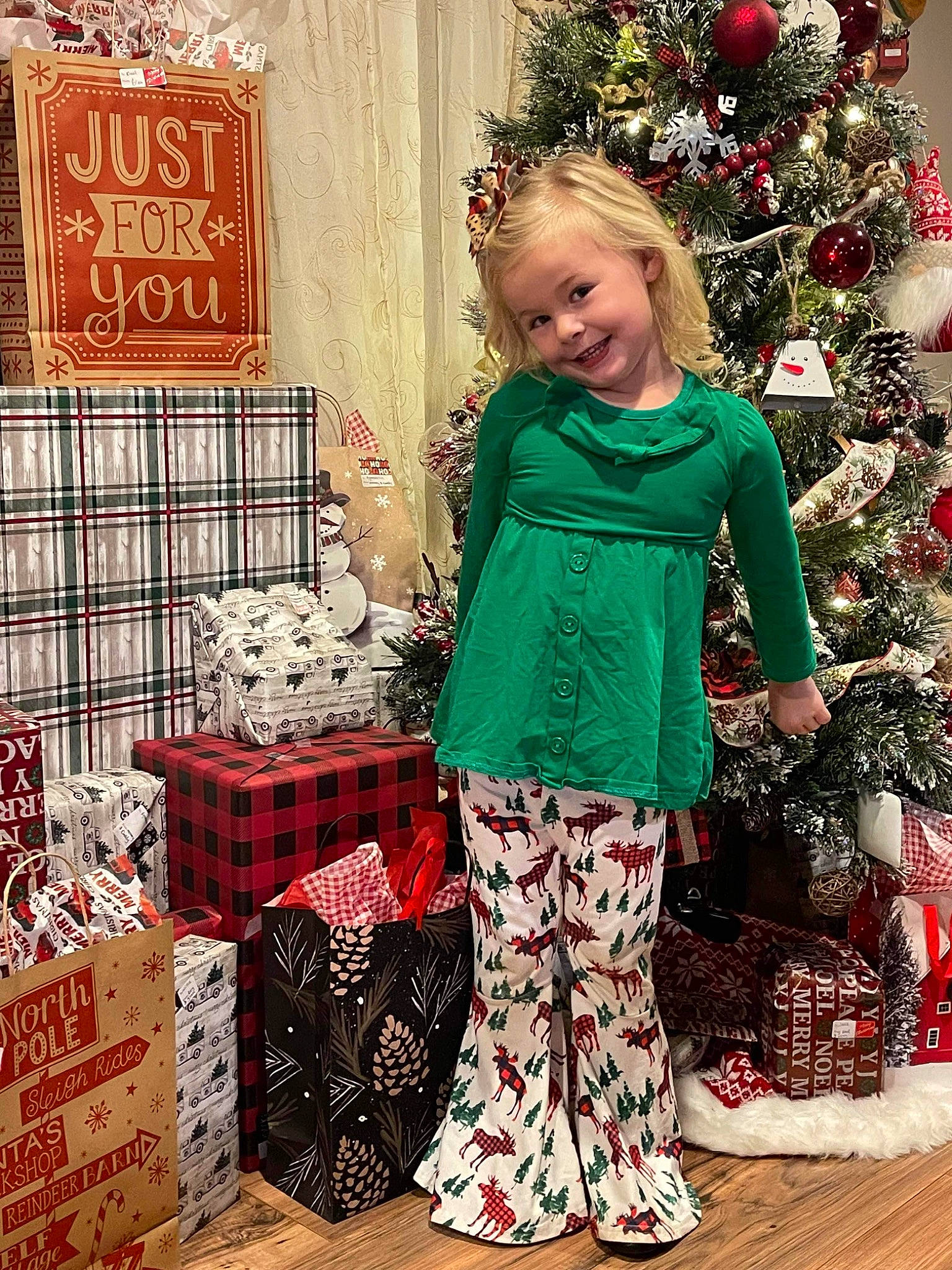 Kymberlin joined the competition — help win amazing prizes! basket, beauty, child, christmas, christmas_decoration, christmas_eve, christmas_ornament, christmas_tree, conifer, event, happy, holiday, joy, ornament, outerwear, pattern, person, room, sleeve, smile