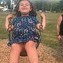Haley joined the competition — help win amazing prizes! child, swing, playground, dress, smiling, outdoor, grass, tree, person, sky, cloud, chain, fun, happy, summer, park, legs, casual_clothing, daytime, recreation