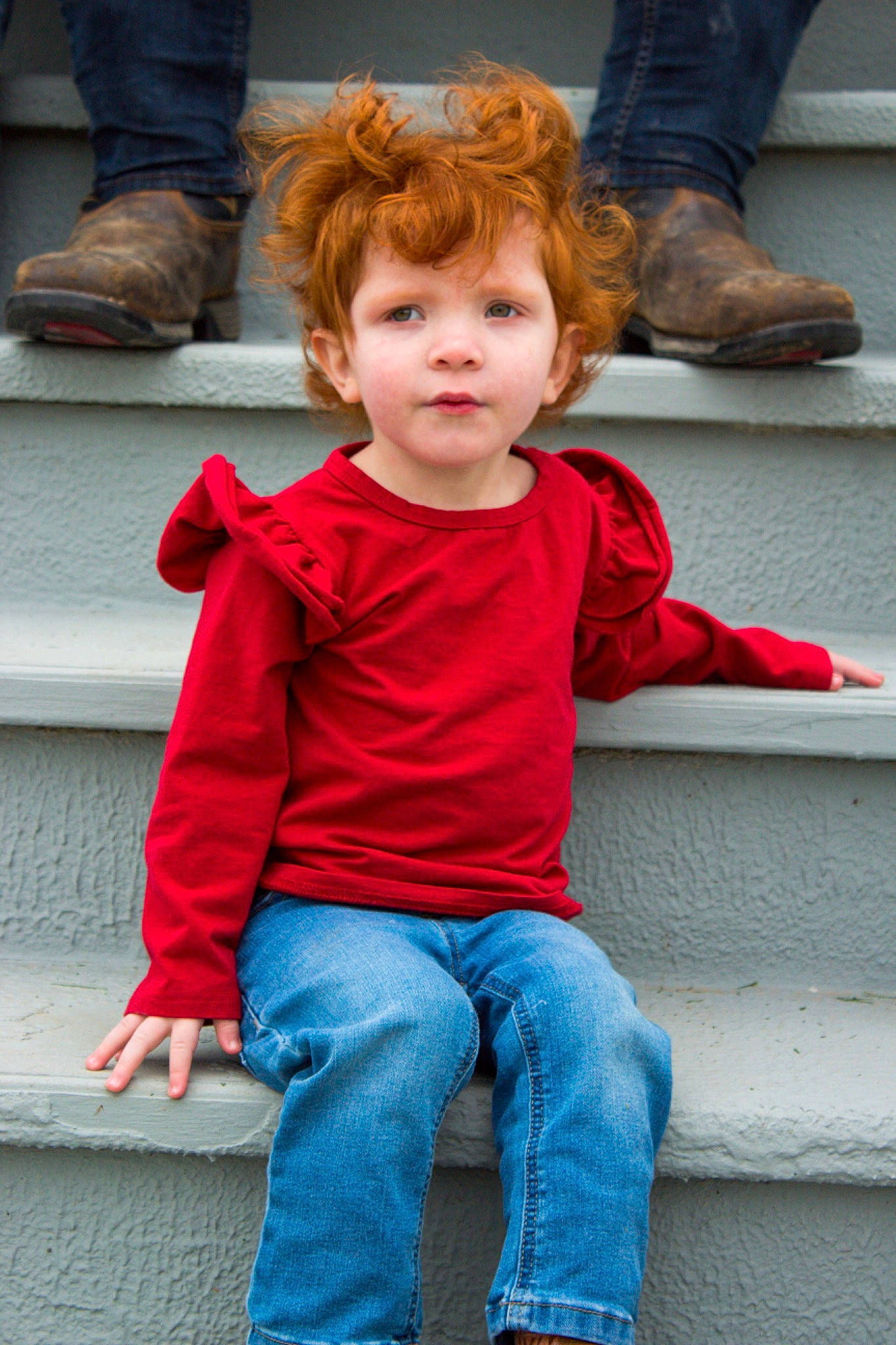 Addilynn is registered to the contest to win money with this photo: baby_toddler_clothing, blue, cheek, clothing, denim, hair, happy, jeans, joint, leg, leisure, person, photograph, red, shoe, sleeve, snapshot, standing, toddler, tree