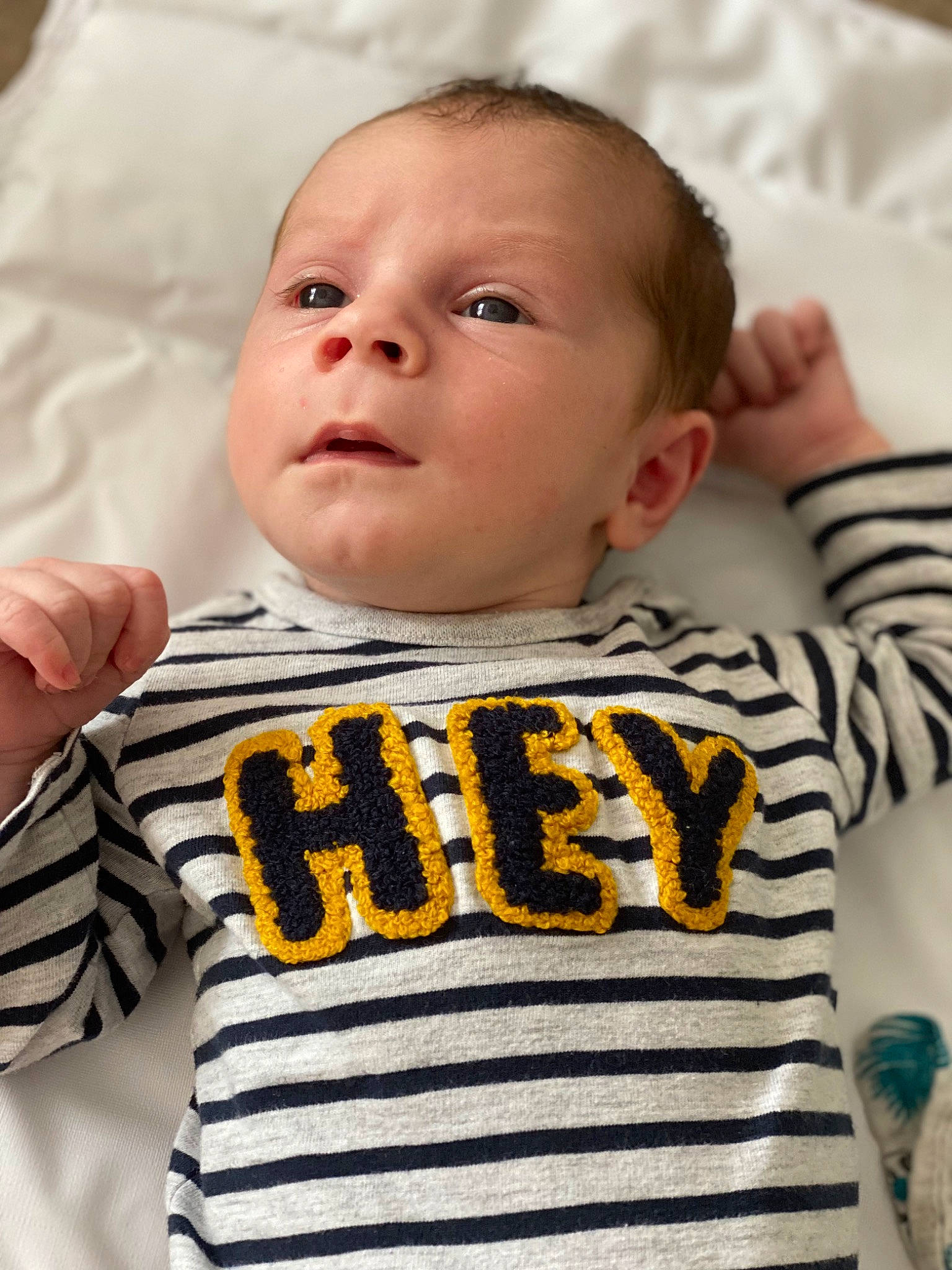 Mattia participe au concours pour gagner de l'argent avec cette photo : baby_toddler_clothing, cheek, chin, eye, eyebrow, face, facial_expression, hairstyle, hand, head, human, lip, mouth, neck, nose, organ, outerwear, person, product, skin