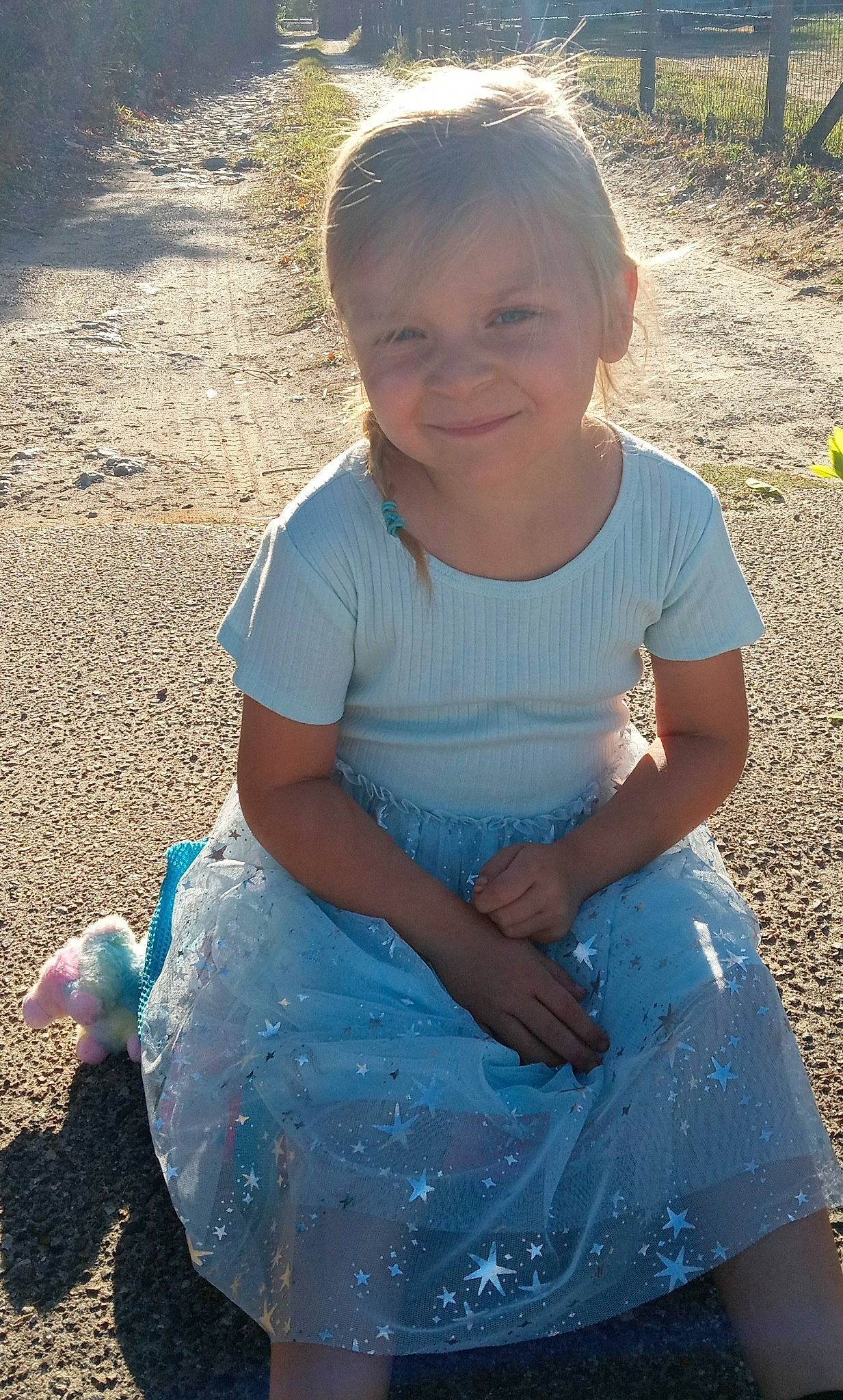 Abigail is registered to the contest to win money with this photo: azure, baby_toddler_clothing, dress, electric_blue, eye, face, finger, fun, grass, hair, hand, happy, head, human_body, iris, joy, leisure, people_in_nature, person, skin