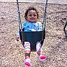 Kataleya joined the competition — help win amazing prizes! child, toddler, swing, playground, outdoor, sunny, grass, wood_chips, clothing, pajamas, happy, smiling, person, park, daytime, play, fun, feet, face, metal_chain