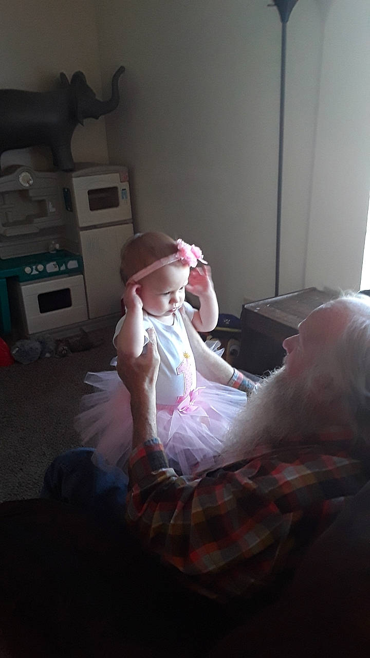 Nevaeh is registered to the contest to win money with this photo: baby, baby_toddler_clothing, bed_sheet, bedroom, day_dress, dress, embellishment, fedora, hair_accessory, hat, linens, living_room, person, pink, plaid, room, ruffle, sitting, sun_hat, tartan