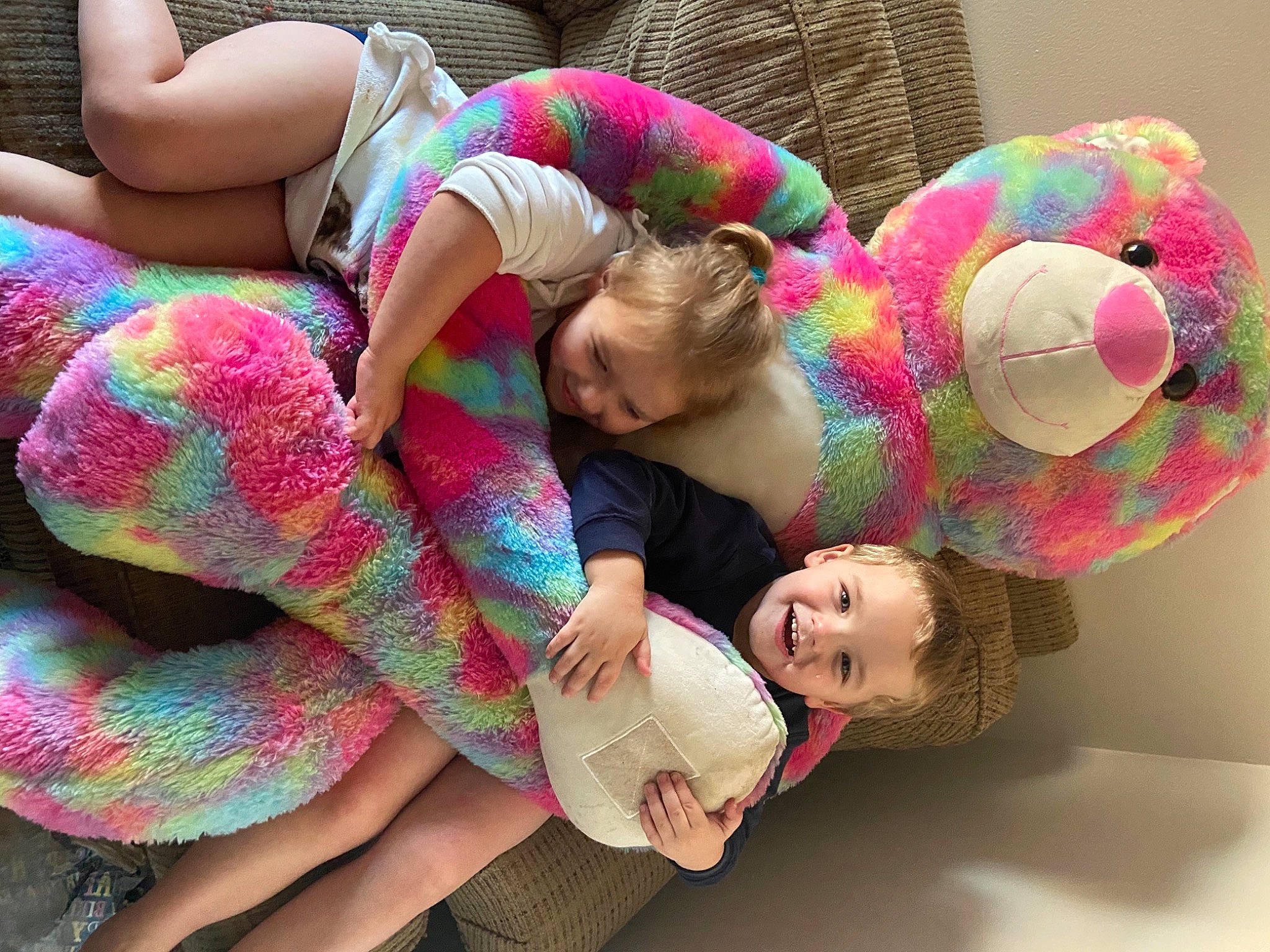 Caleb is registered to the contest to win money with this photo: human, interaction, joy, knitting, love, magenta, person, pink, plush, stuffed_toy, teddy_bear, textile, thread, toy, wool, woolen