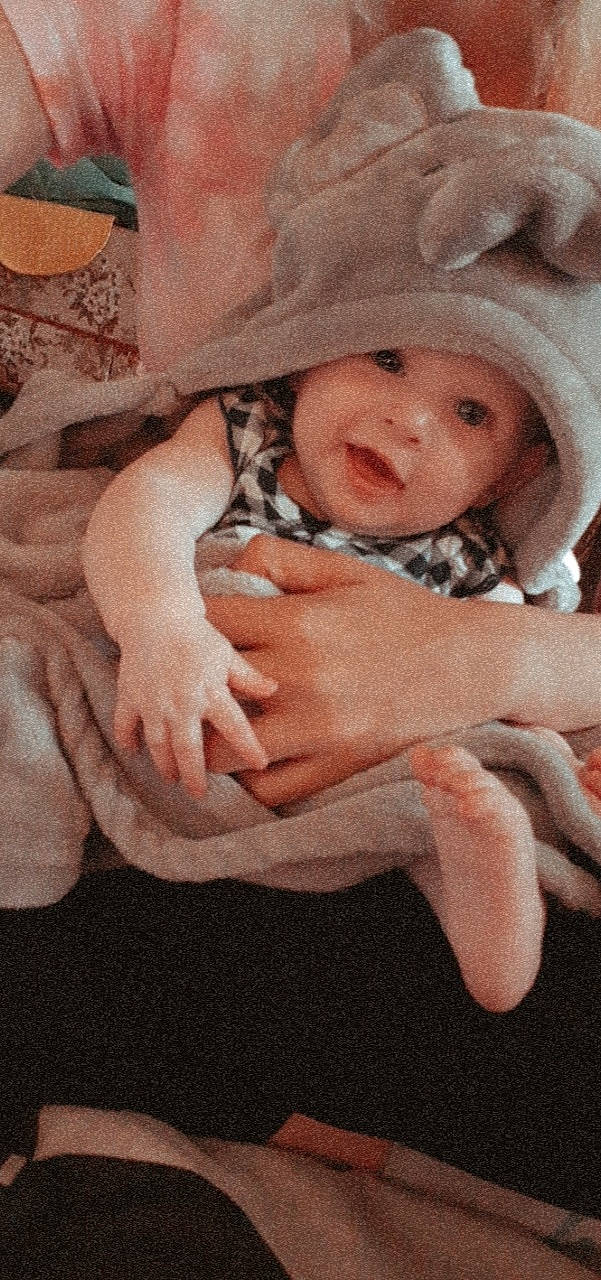 Kynzlee joined the competition — help win amazing prizes! baby, child, finger, gesture, hand, headwear, person, thumb, toddler