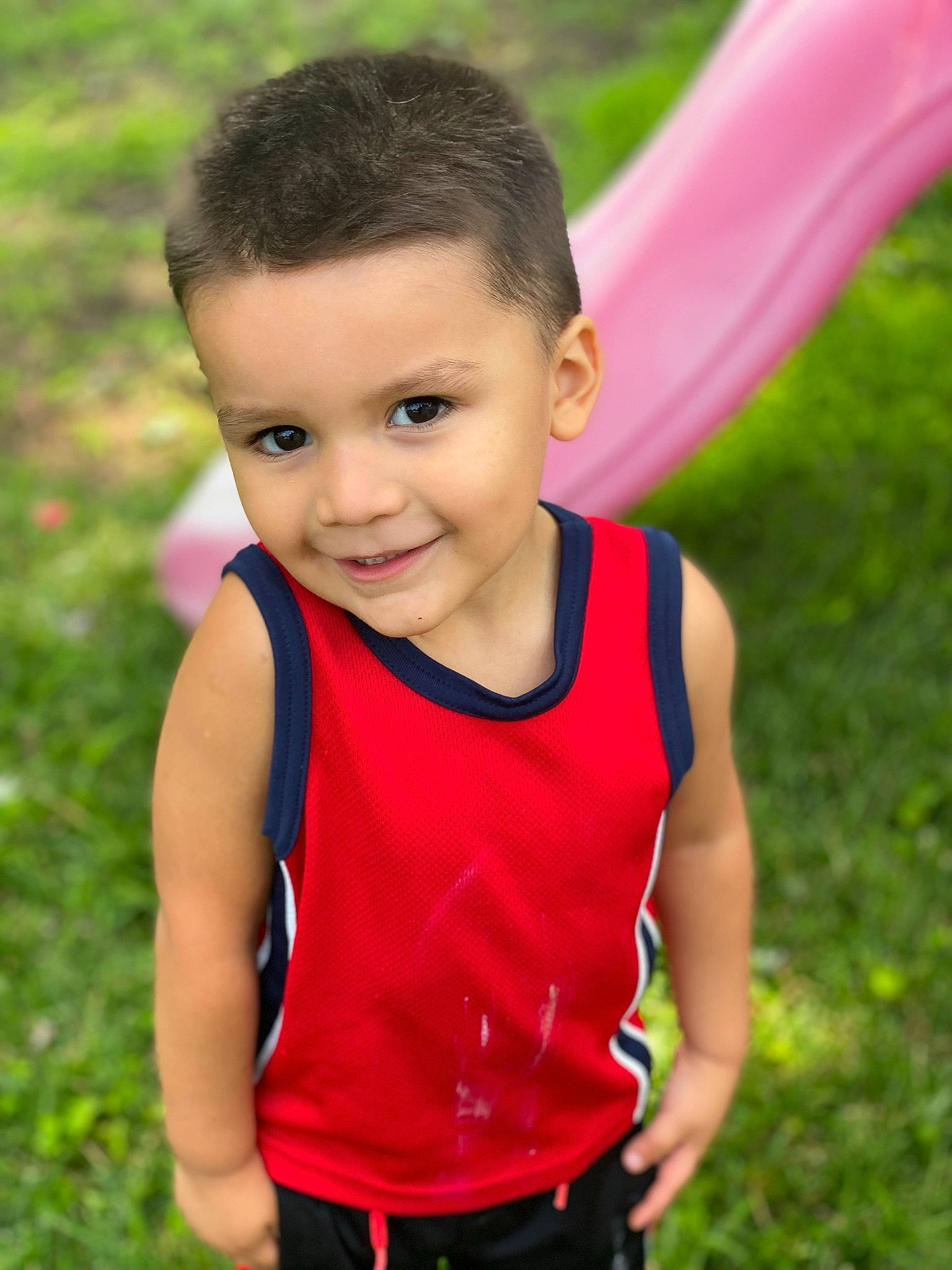 Emiliano joined the competition — help win amazing prizes! athlete, chest, child, endurance_sports, eye, fun, gesture, grass, happy, joy, leisure, neck, people_in_nature, person, pink, recreation, running, smile, sportswear, t_shirt