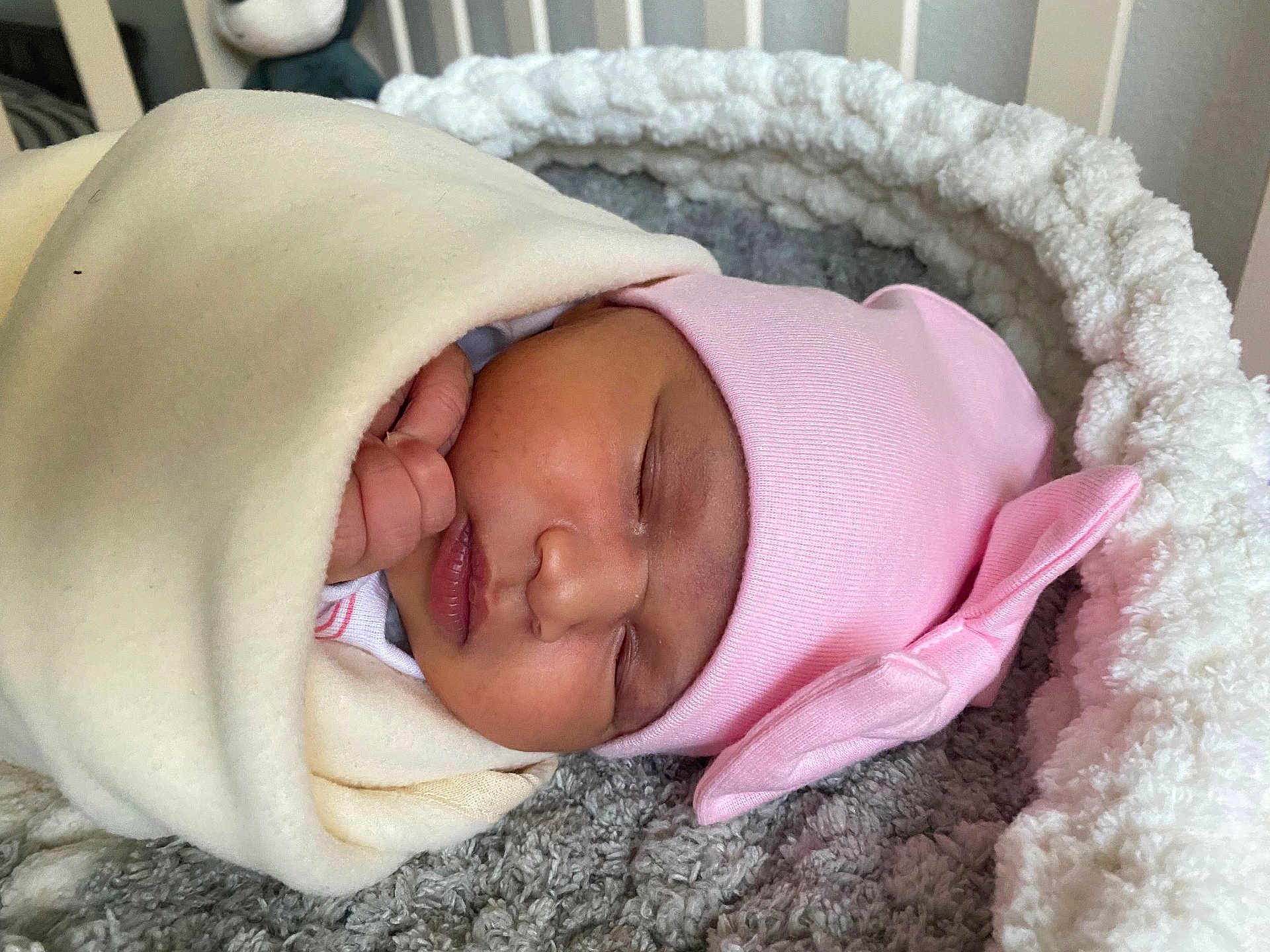 Abigail joined the competition — help win amazing prizes! baby, baby_bedding, blanket, bow, child, closeup, cozy, cute, face, indoors, infant, newborn, newborn_baby, pink_hat, portrait, resting, sleeping, soft, warm, wrapped