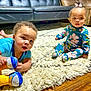 Raylen is registered to the contest to win money with this photo: architecture, baby, ball, building, couch, cushion, face, furniture, head, homedecor, indoors, livingroom, person, photography, portrait, room, sitting, sport, volleyball, volleyballball