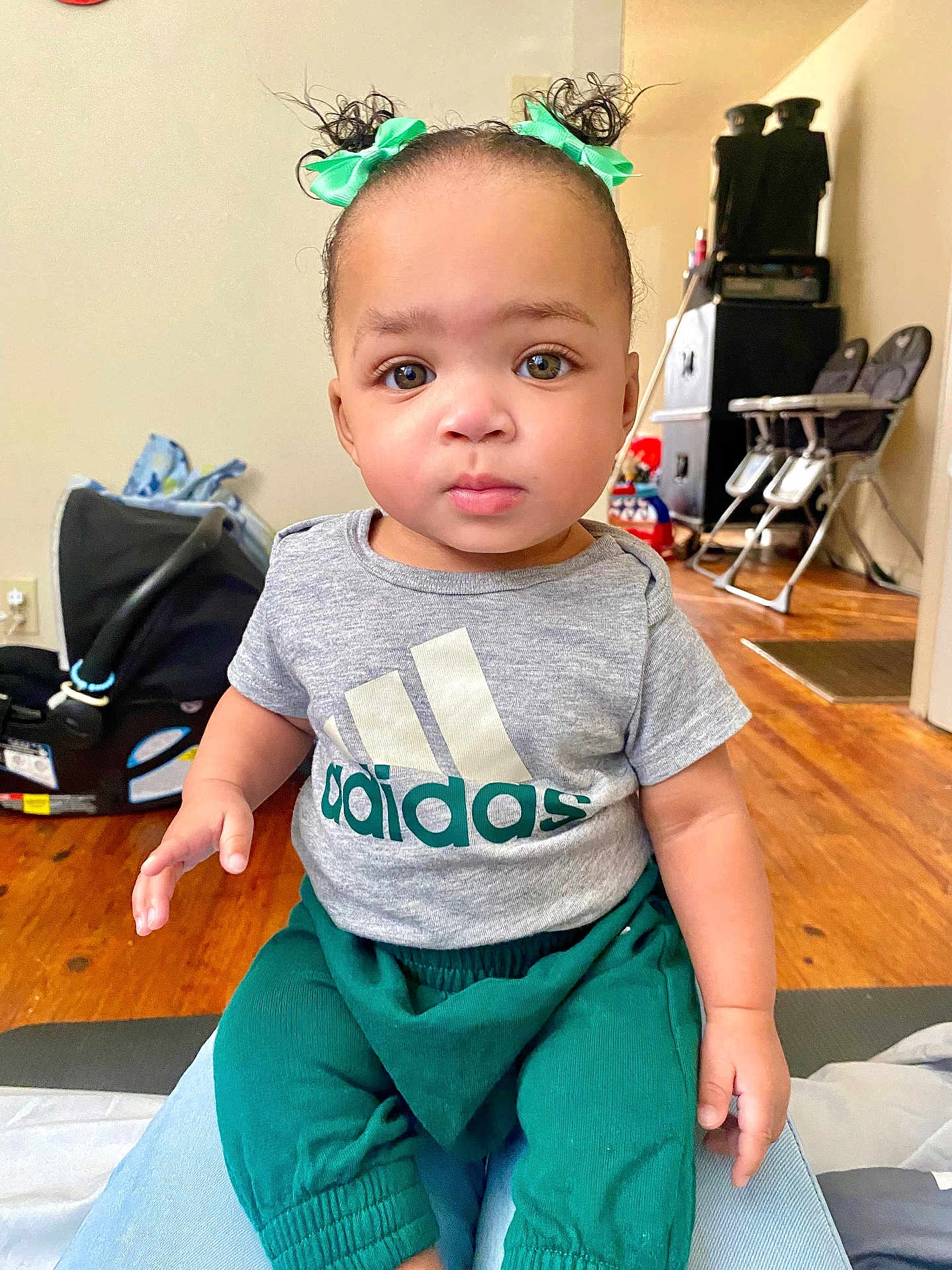 Raylen joined the competition — help win amazing prizes! accessories, baby, blackhair, clothing, cushion, face, furniture, hair, hardwood, head, homedecor, indoors, pants, person, photography, portrait, sitting, sleeve, t_shirt, wood