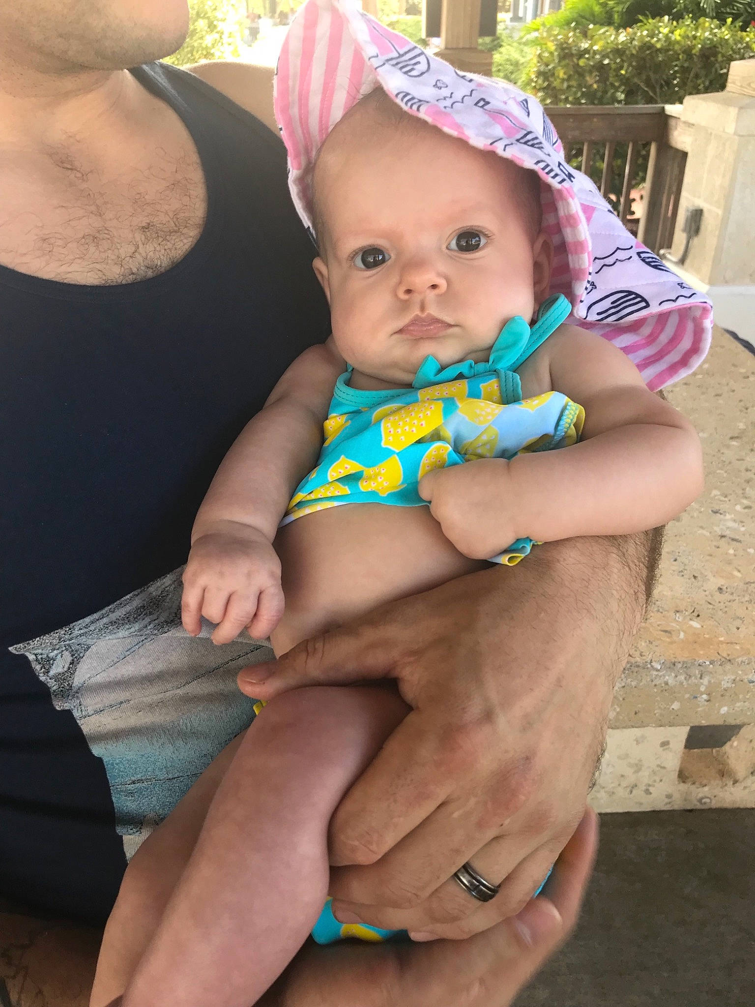 Elliotte is registered to the contest to win money with this photo: baby, child, finger, fun, hand, leg, neck, person, sitting, skin, smile, thigh, toddler, vacation