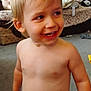 Draven is registered to the contest to win money with this photo: child, toddler, smiling, diaper, indoor, toy, stuffed_animal, blond_hair, happy, bare_chest, carpet, living_room, furniture, blanket, person, background, playful, cute, young_child, family