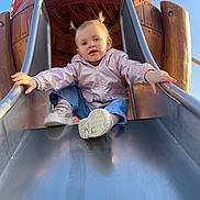 Victorya participe au concours pour gagner de l'argent avec cette photo : candid, child, cute, infant, jacket, metal_slide, outdoor, pigtails, pink_jacket, playground, playing, portrait, shoe, sky, slide, smile, sneakers, sunlight, toddler, wooden_structure