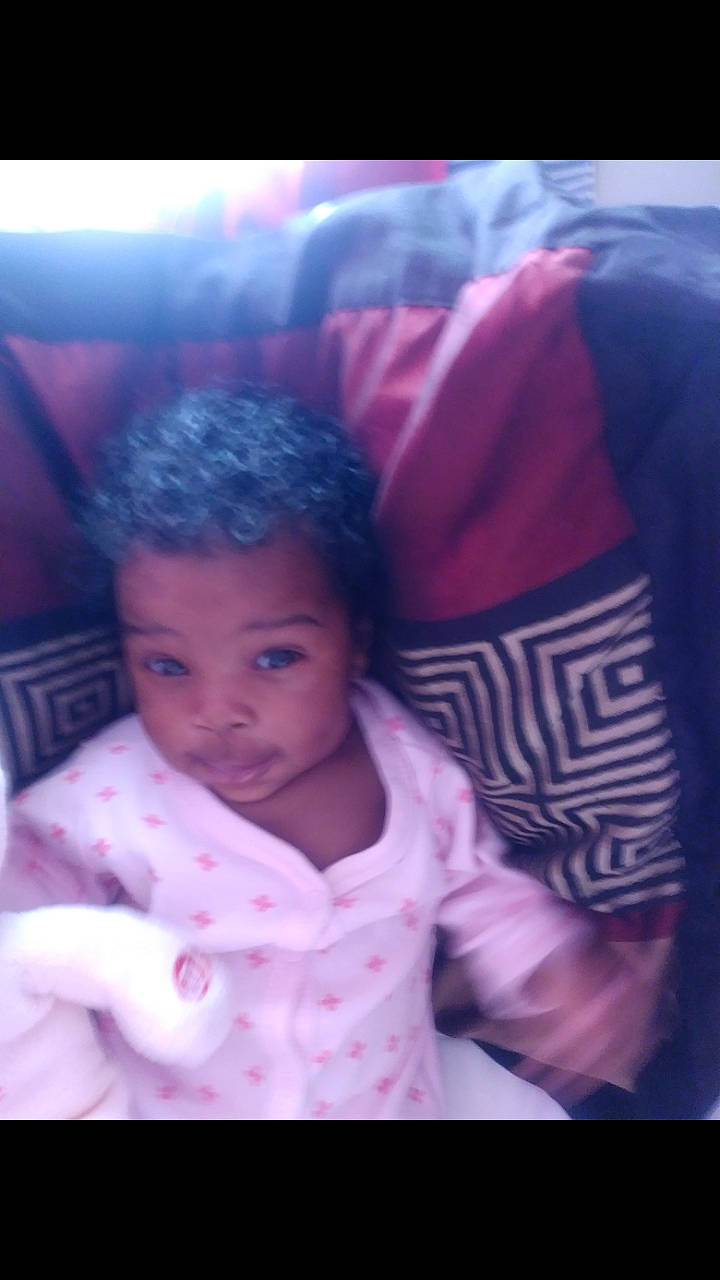 E'Mani joined the competition — help win amazing prizes! beauty, cheek, child, day, eye, face, fun, girl, hair, head, human_hair_color, infant, nose, person, pink, purple, sitting, skin, smile, toddler