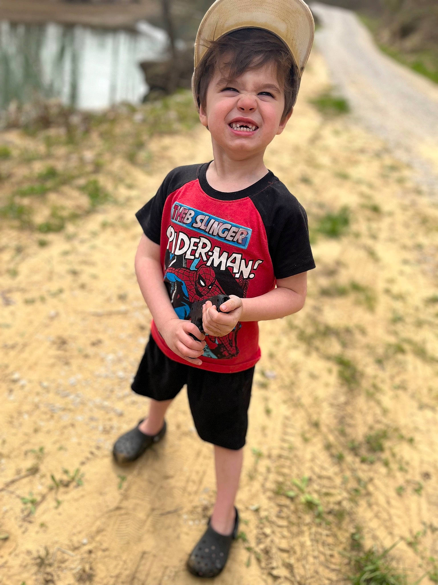 Brison is registered to the contest to win money with this photo: anger, cap, child, eye, face, flash_photography, fun, grass, happy, hat, head, landscape, leisure, people_in_nature, person, recreation, shoe, shorts, sleeve, smile