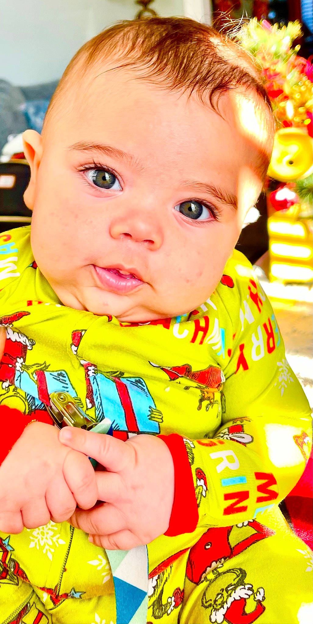 Gabriel is registered to the contest to win money with this photo: baby, baby_toddler_clothing, cheek, child, chin, eye, eyelash, face, happy, head, iris, lip, mouth, nose, orange, person, product, skin, sleeve, toddler