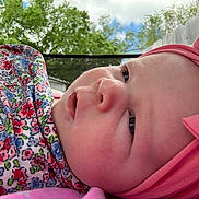 Catalina joined the competition — help win amazing prizes! baby, infant, close_up, face, headband, pink, bow, blanket, floral_pattern, outdoor, trees, sky, clouds, child, cute, portrait, soft_skin, expression, person, nature