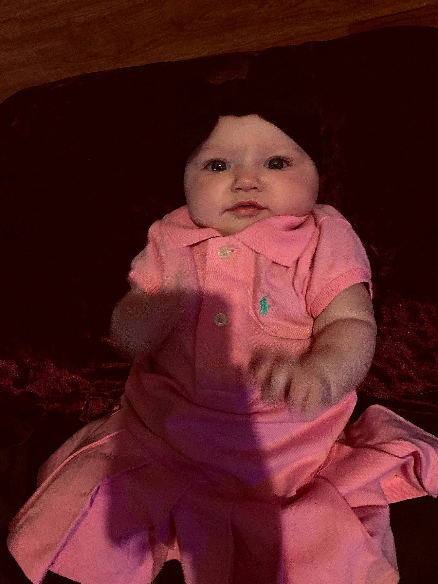 Aryanna is registered to the contest to win money with this photo: baby, baby_toddler_clothing, child, day_dress, dress, formal_wear, fur, happy, headwear, lip, magenta, outerwear, peach, person, pink, plant, sitting, skin, sleeve, standing