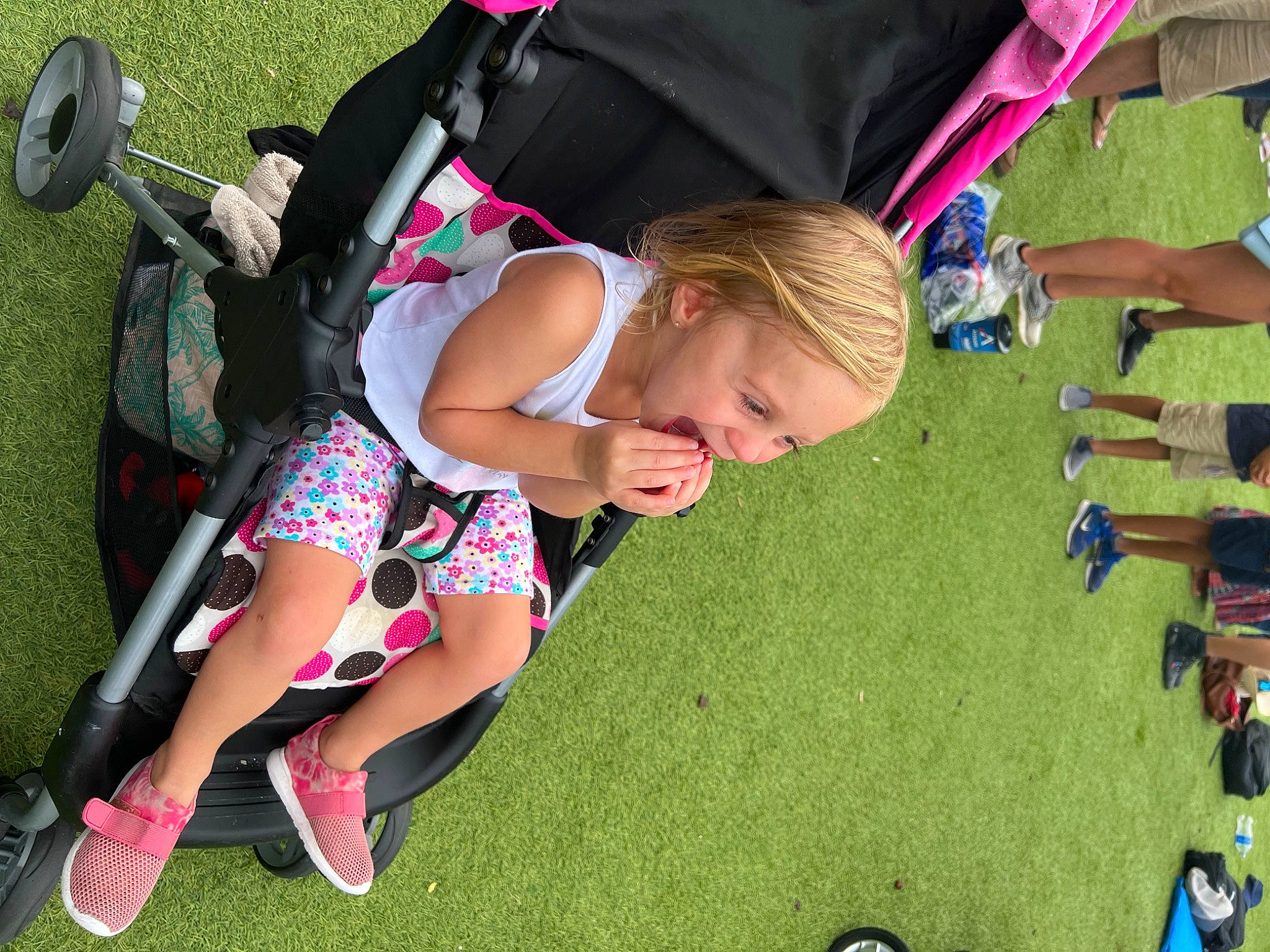 Olivia joined the competition — help win amazing prizes! child, competition_event, fun, grass, human_leg, knee, lap, lawn, leisure, luggage_and_bags, person, product, public_space, recreation, shorts, summer, thigh, tire, toddler, toy