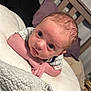 Kolten is registered to the contest to win money with this photo: baby, infant, child, bed, pillow, blanket, blue_eyes, skin, hair, clothing, indoor, furniture, head, face, arms, curious, lying_down, soft, expression, closeup