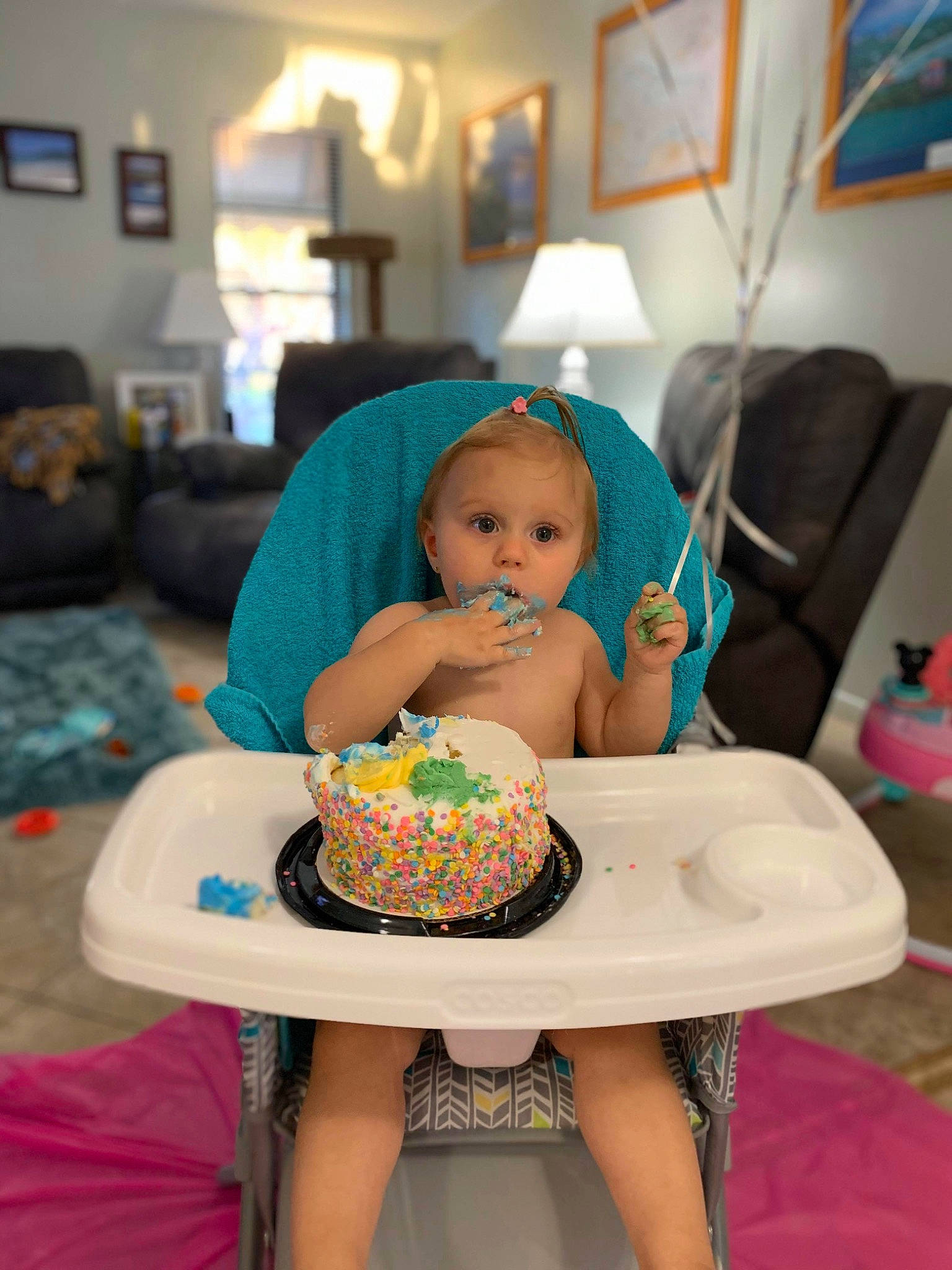 Olivia is registered to the contest to win money with this photo: baby, baked_goods, birthday, birthday_cake, buttercream, cake, cake_decorating, child, dessert, eating, fondant, food, icing, party, person, pink, sitting, sugar_paste, sweetness, toddler