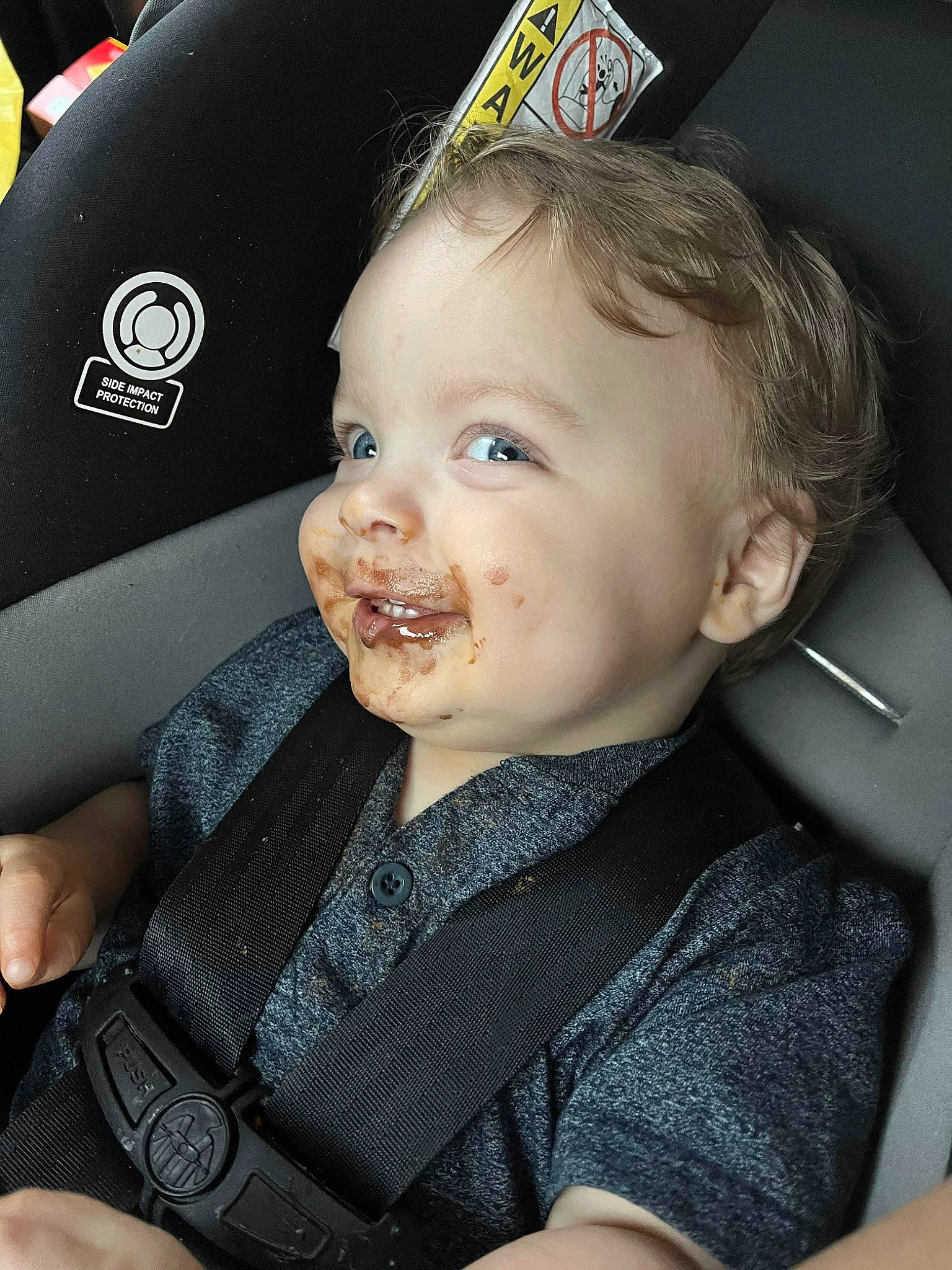 Conner is registered to the contest to win money with this photo: auto_part, baby, baby_carriage, baby_in_car_seat, baby_products, baby_toddler_clothing, beauty, car_seat, cheek, child, comfort, costume_hat, fashion_accessory, party_hat, person, seat_belt, sitting, skin, smile, steering_wheel