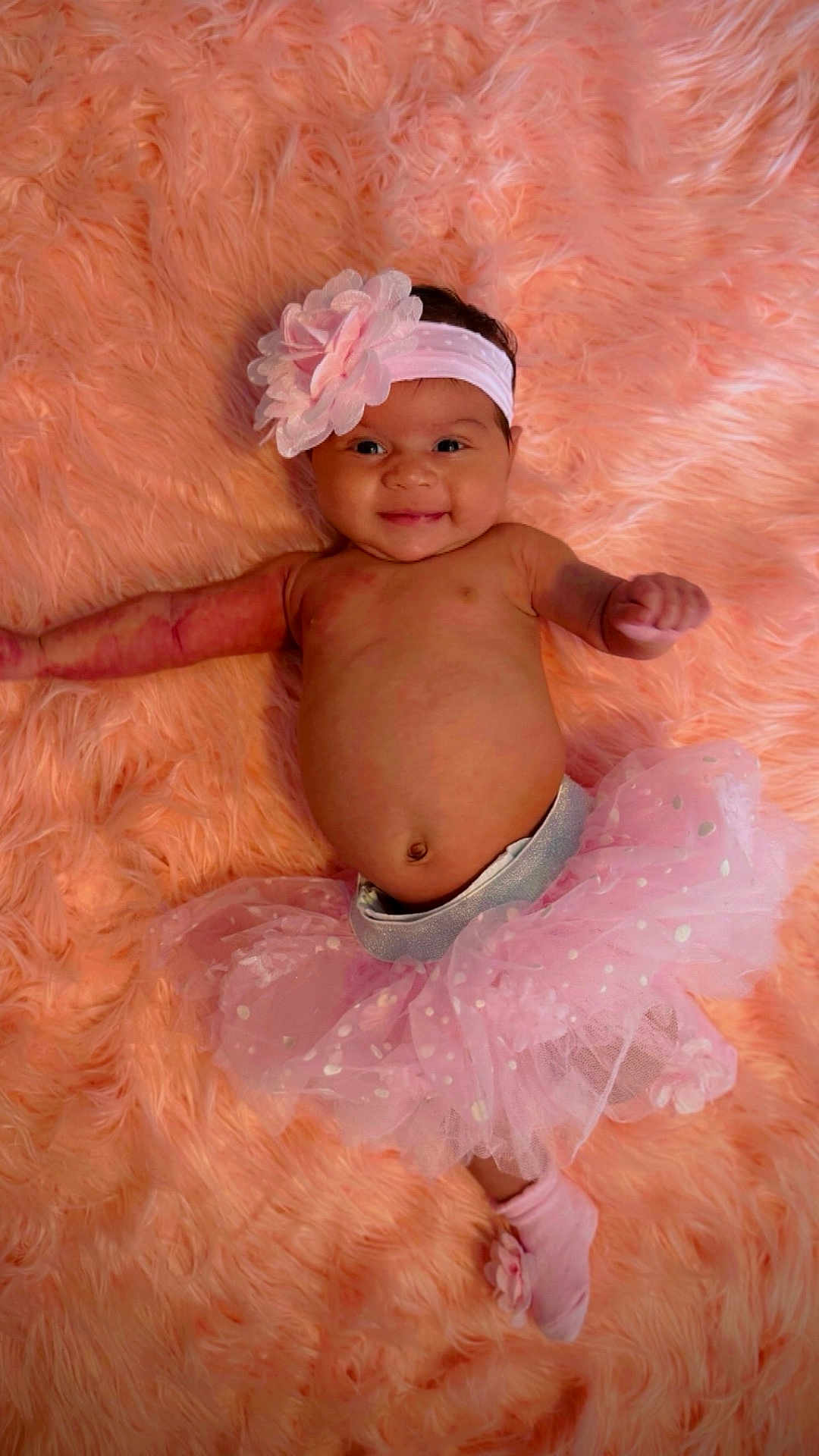 Nevaeh joined the competition — help win amazing prizes! accessories, baby, bodypart, bonnet, cap, clothing, costume, dress, face, finger, hand, happy, hat, head, newborn, person, photography, portrait, sitting, smile