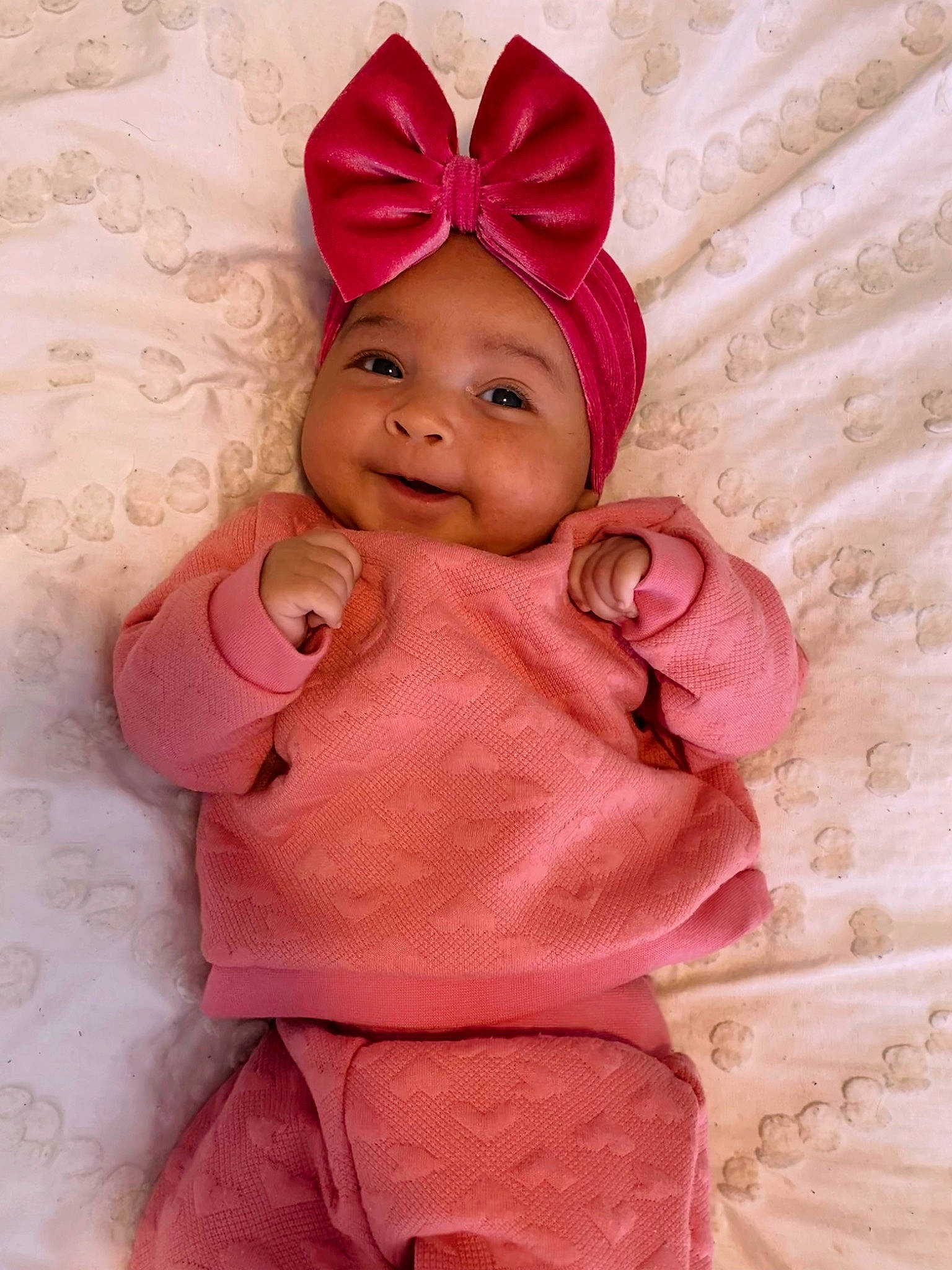 Kenley joined the competition — help win amazing prizes! baby, baby_toddler_clothing, cap, chin, costume_hat, face, finger, hand, happy, head, headwear, human_body, lip, magenta, mythical_creature, nose, outerwear, person, pink, skin