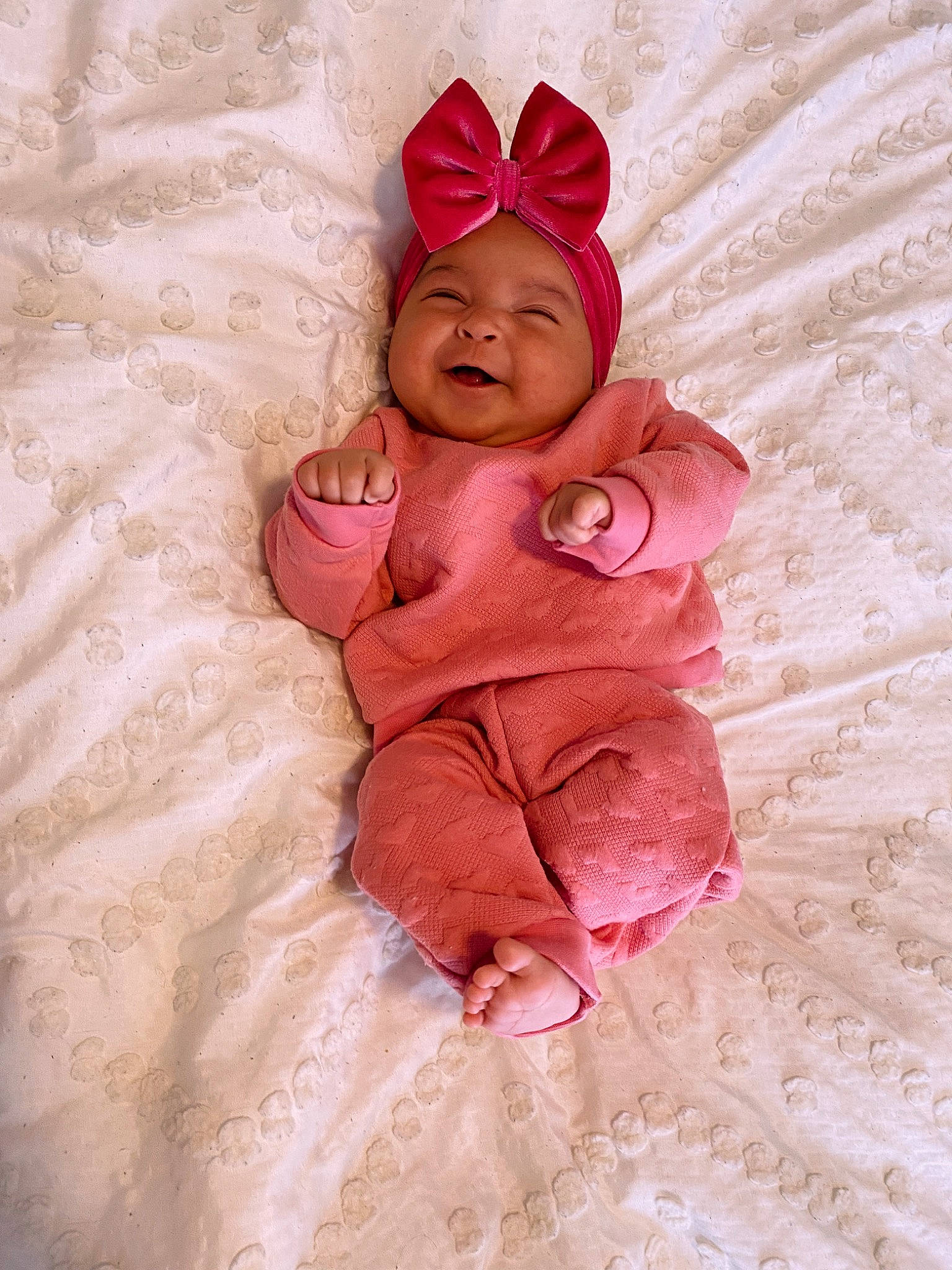 Kenley joined the competition — help win amazing prizes! baby, baby_sleeping, baby_toddler_clothing, cap, cheek, child, comfort, eye, face, flooring, happy, headgear, headwear, human_body, linens, magenta, person, petal, pink, sleeve