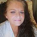 Sharon E C.